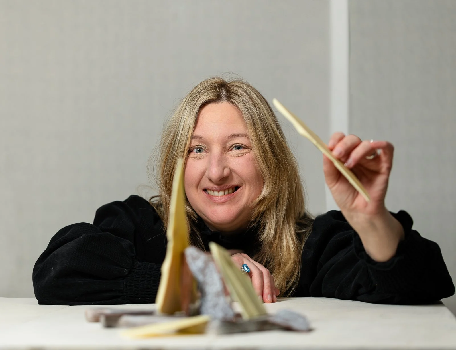 Karry Witt, artisan chocolatier with white chocolate