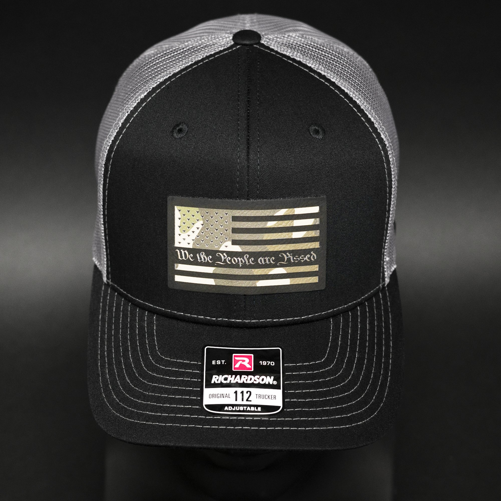 Rirchardson112-We-The-People-Are-Pissed-American-Flag-Trucker-Hat.jpg