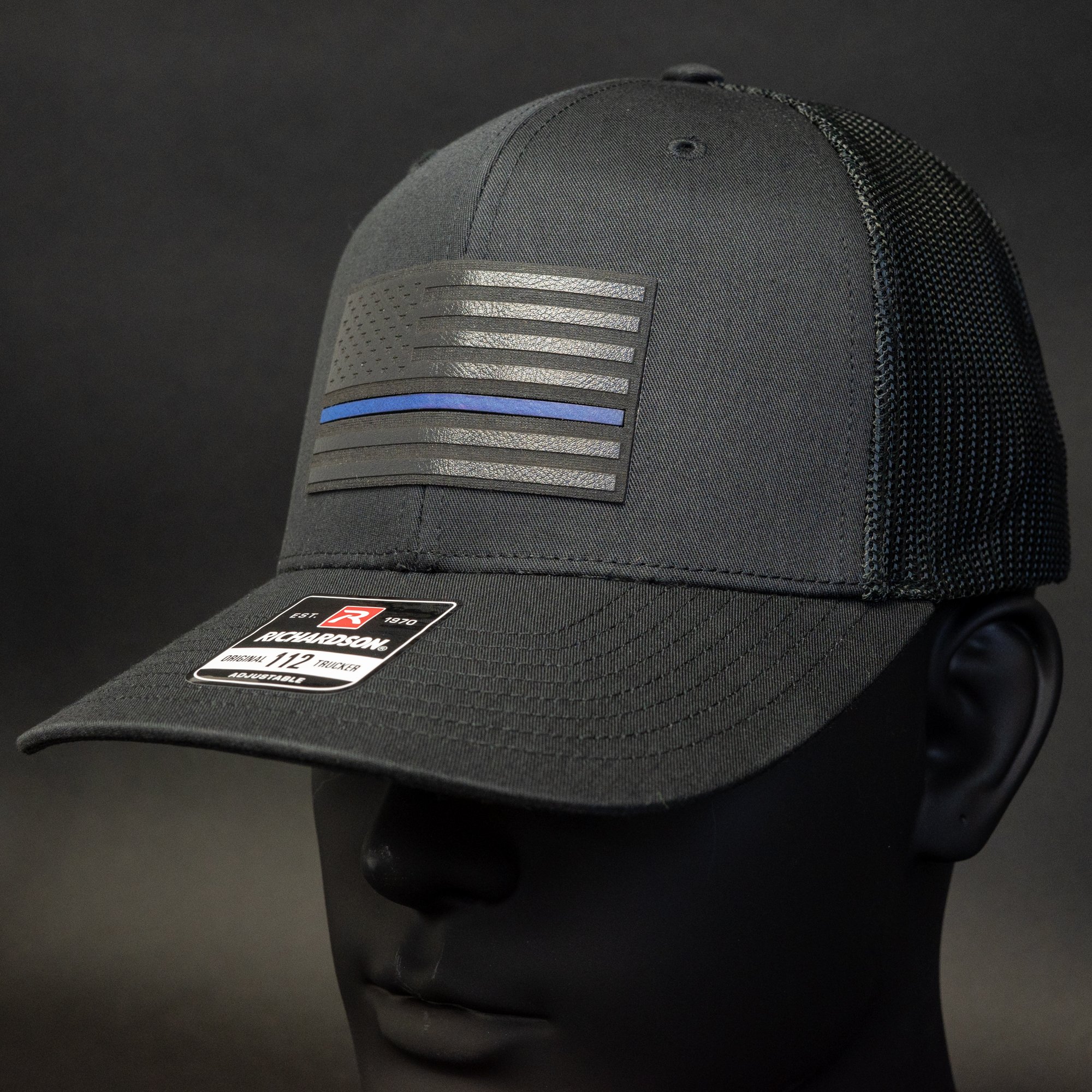 Police-blue-line-with-American-Falg-Trucker-Hat.jpg