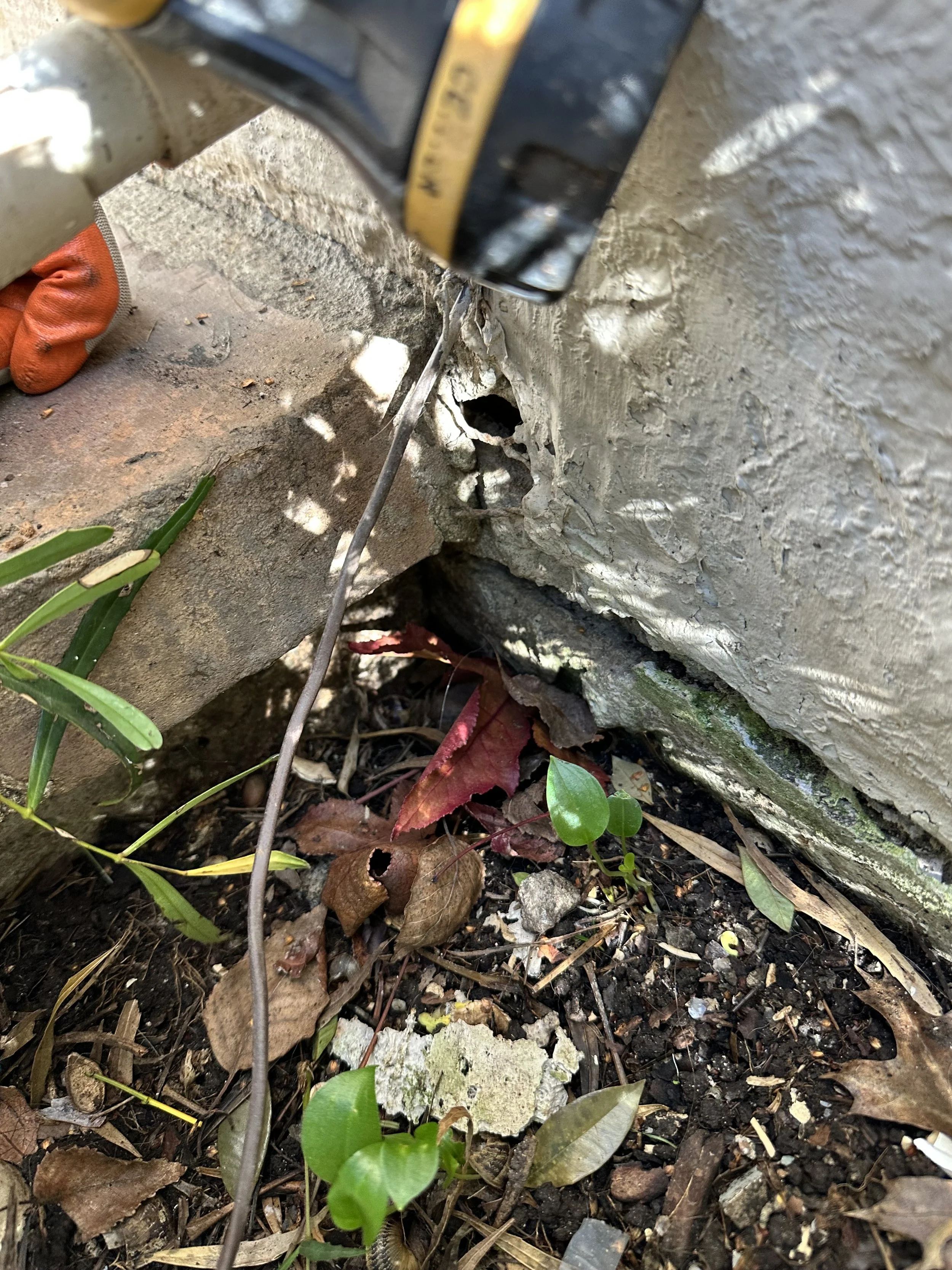 Hidden hole in stucco