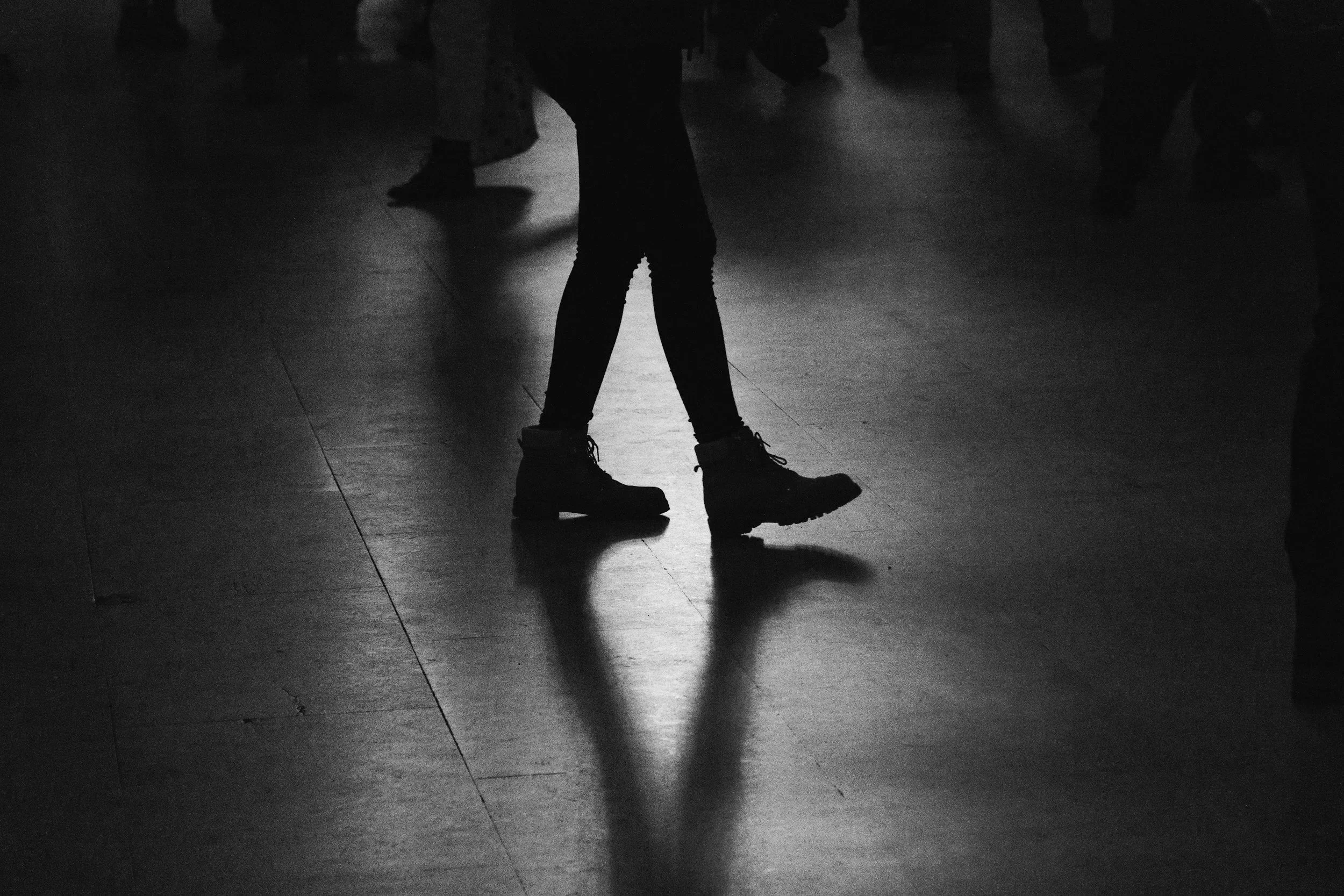 a photo of  a women's legs and boots.
