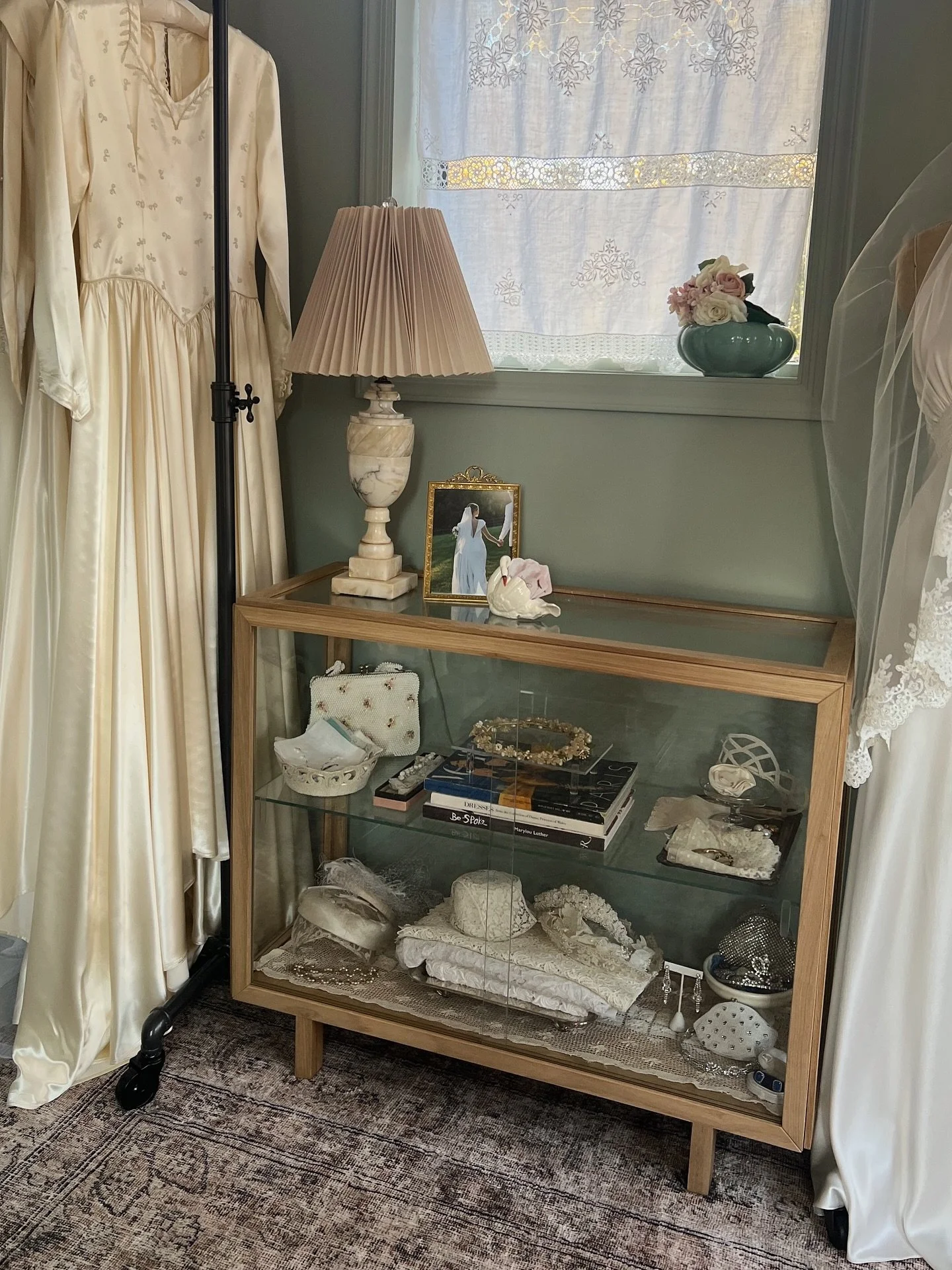Slowly but surely, this new space is starting to feel like home! Today's client fitting-complete with bridal headpieces, jewelry and purses made the new display unit an instant success. 
#vintagebridal #weddingwear 
#nostalgia #bespokebride
