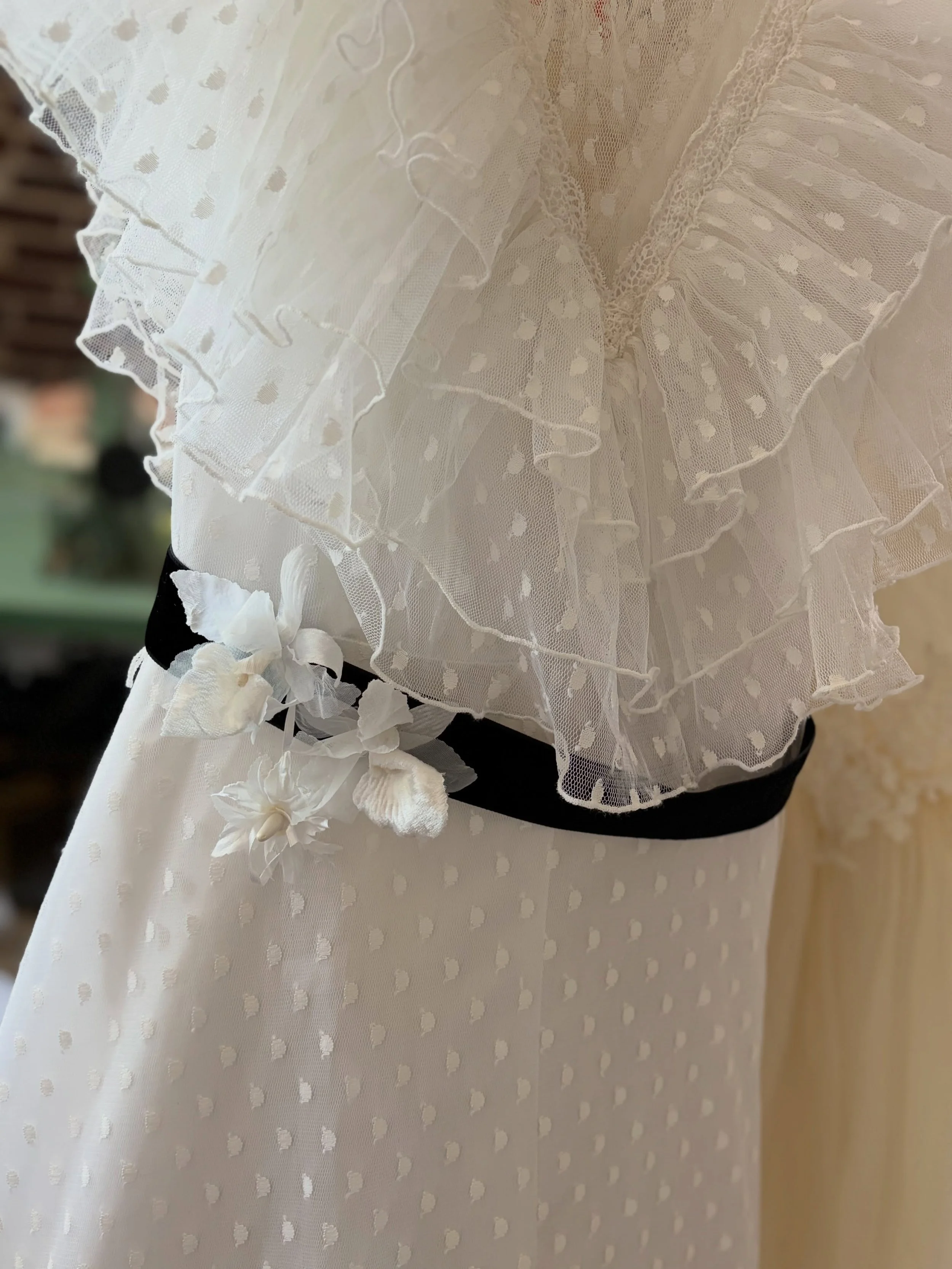 The hardest part about reimagining bridal fashion sustainably? Knowing when to let go and figuring out how to reinvent. 🔄✨

This beautiful 1980s point d'esprit gown originally came with a matching hat. Unfortunately, between yellowed glue and rusted