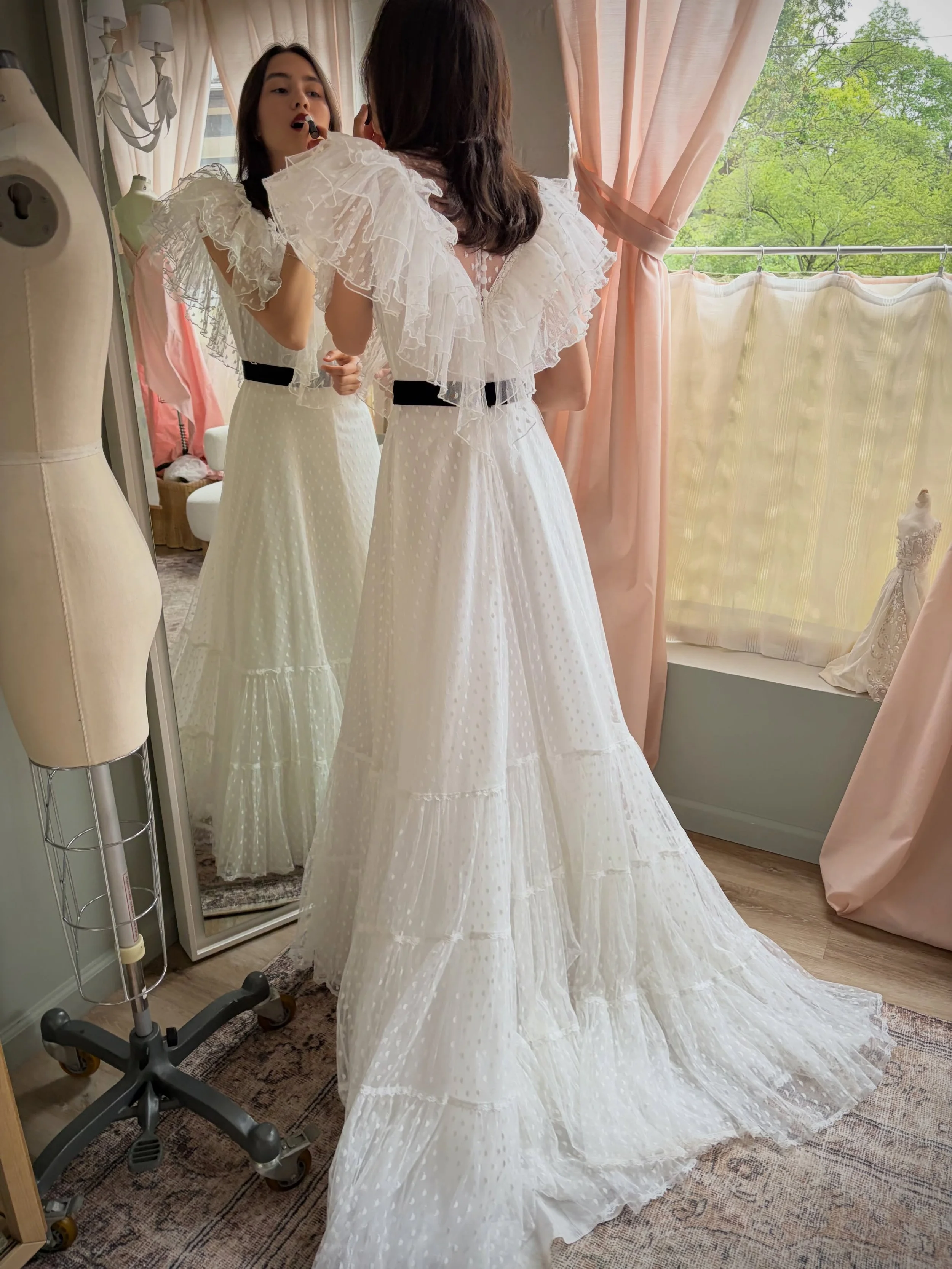 Heading into Memorial Day weekend with a perfect summer look. 🌞

We are completely captivated by the graphic contrast of this look&mdash;punching up a breathtakingly romantic, white point d&rsquo;esprit vintage bridal gown with a rich black velvet s
