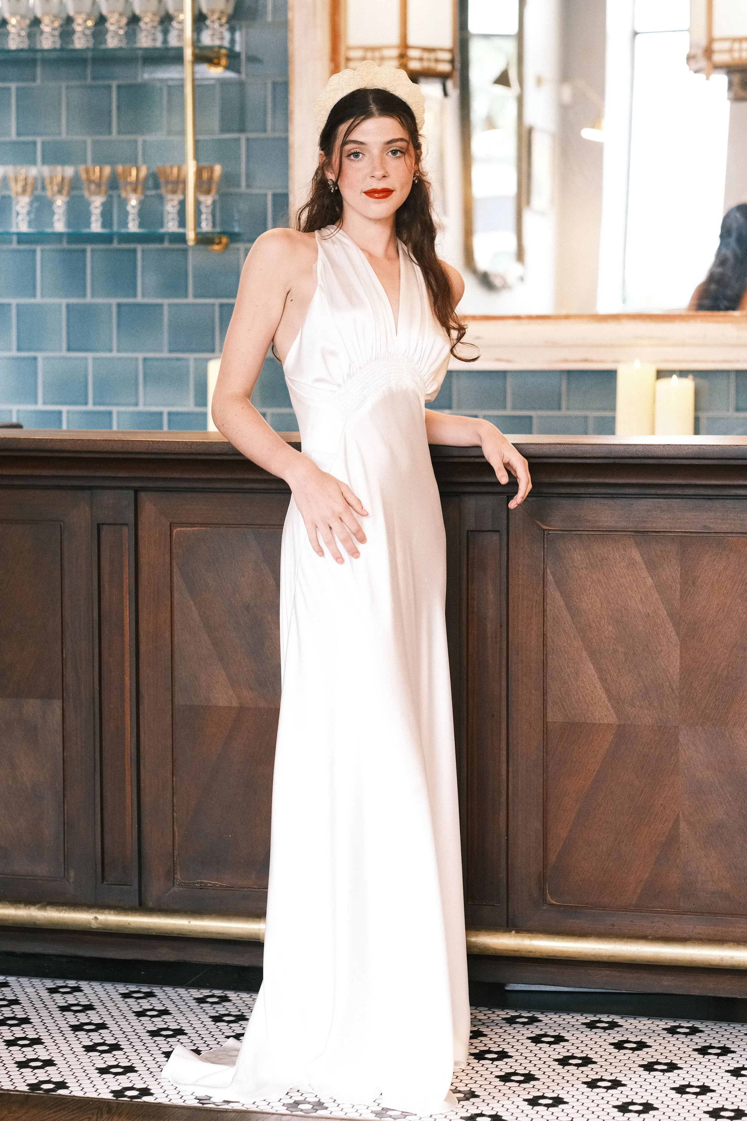 Woman wearing a Maybelle original vintage style wedding dress.