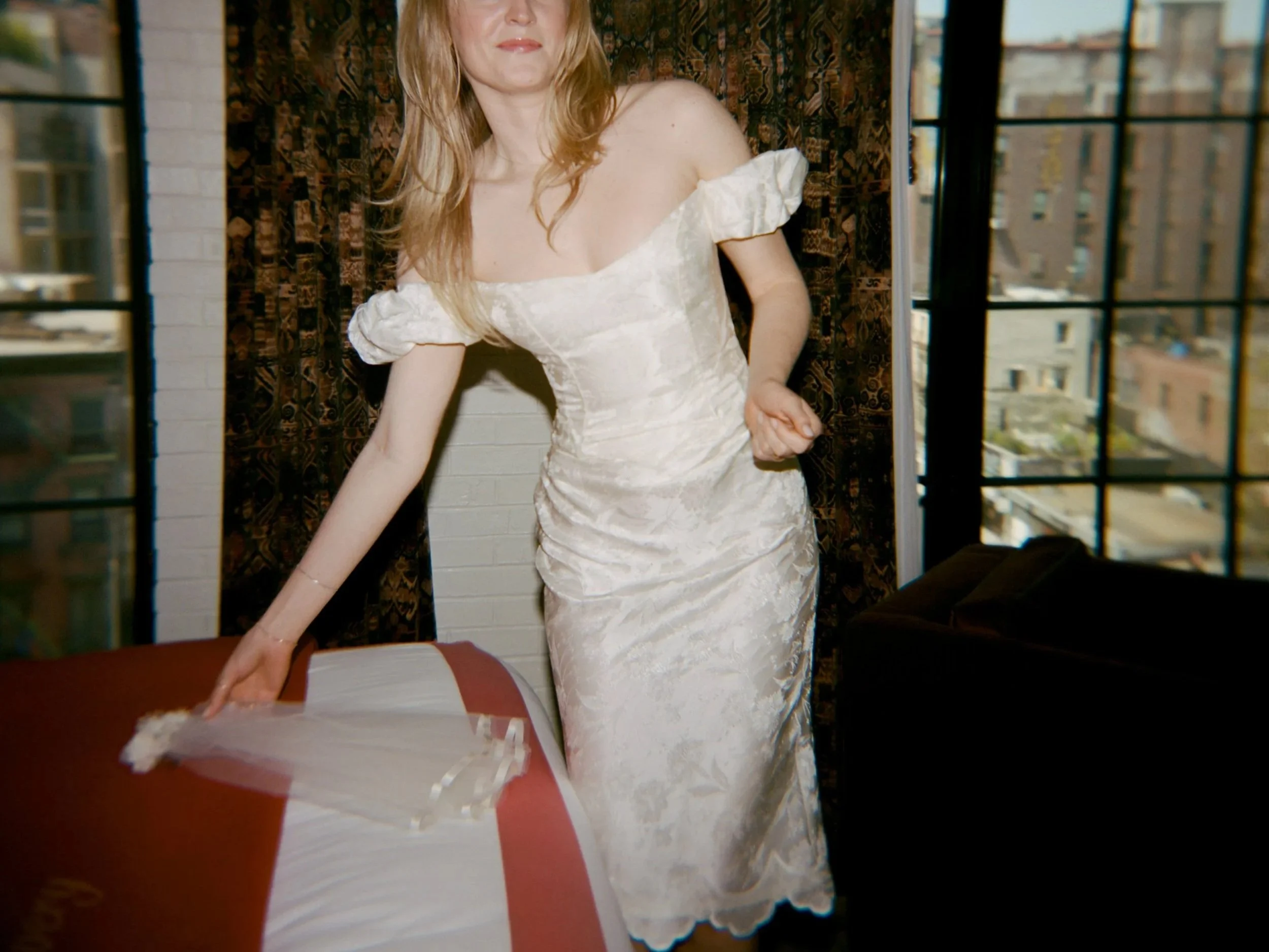 Maybelle bride in a family heirloom vintage dress that was restored and reimagined for her wedding.