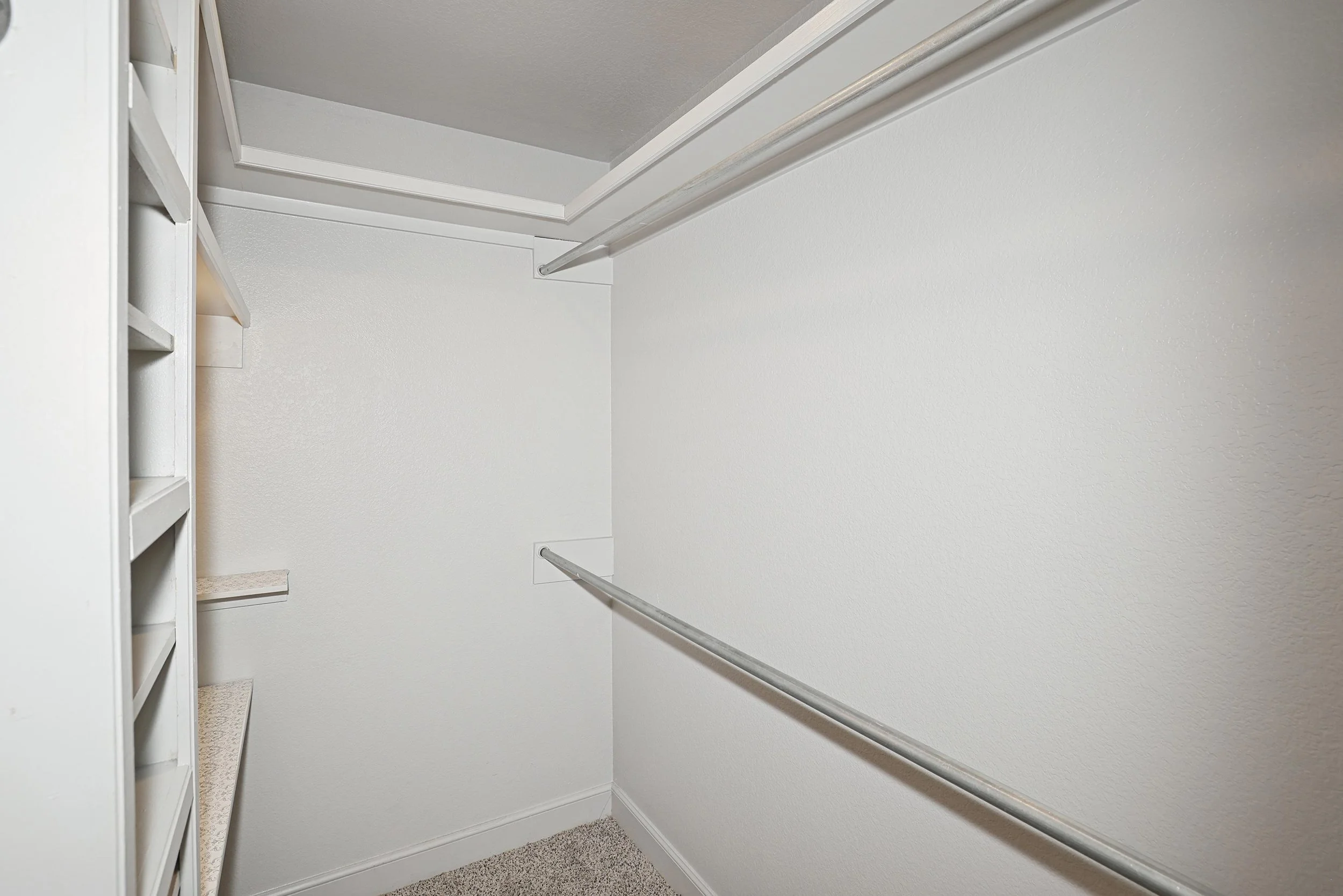 26-Primary Closet Hers.jpg