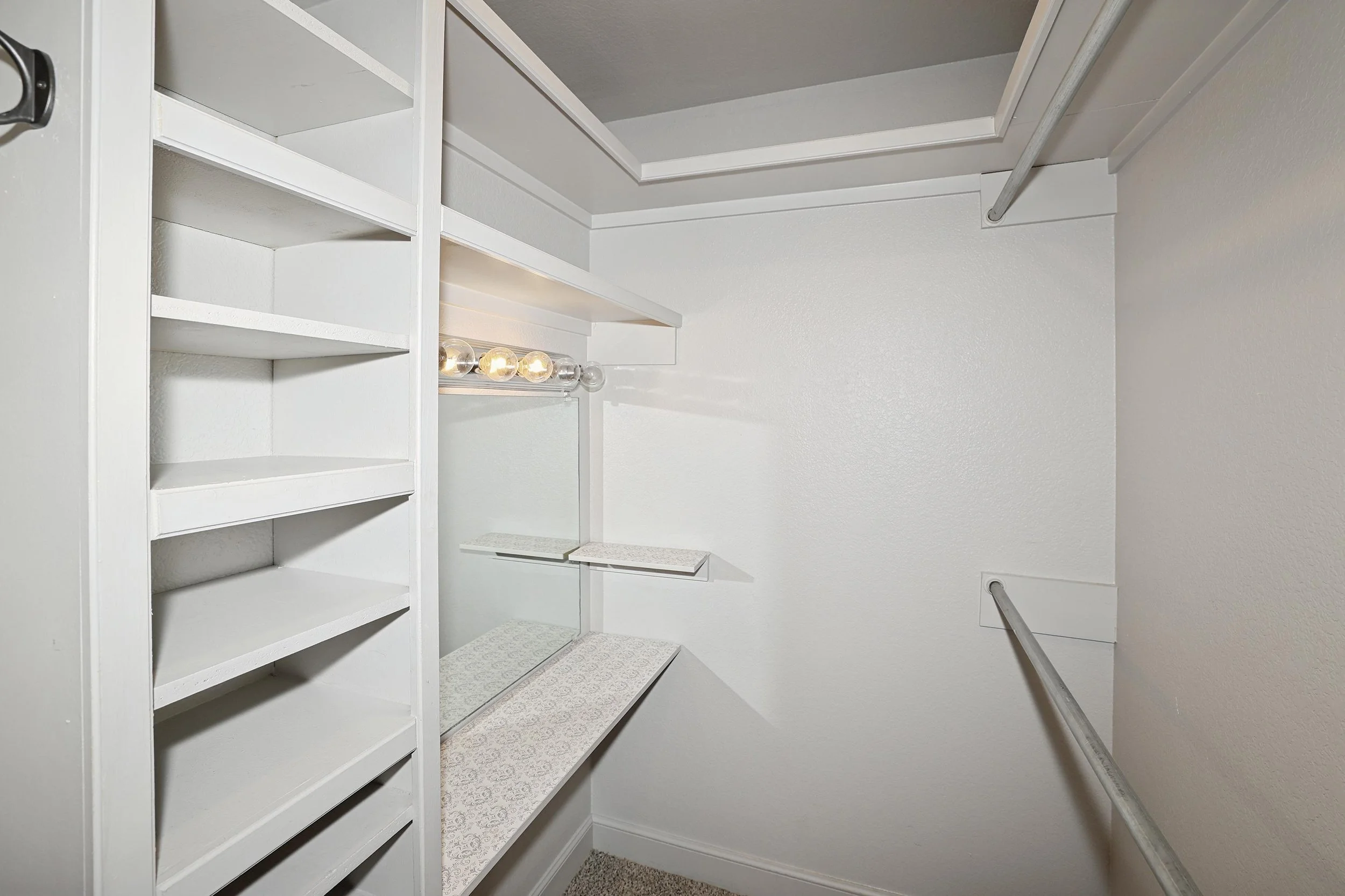 27-Primary Closet Hers.jpg