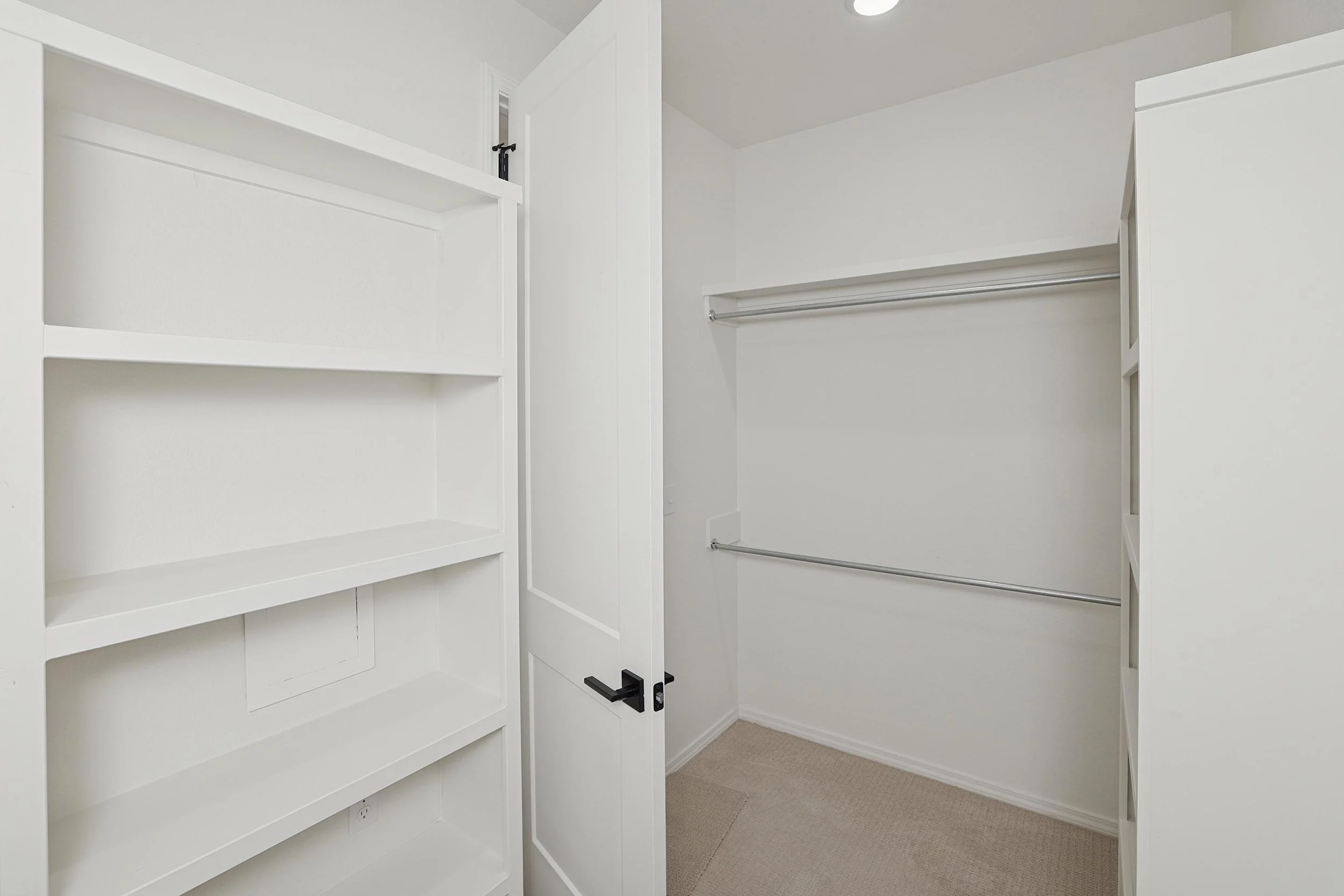 22-Primary Closet Hers.jpg