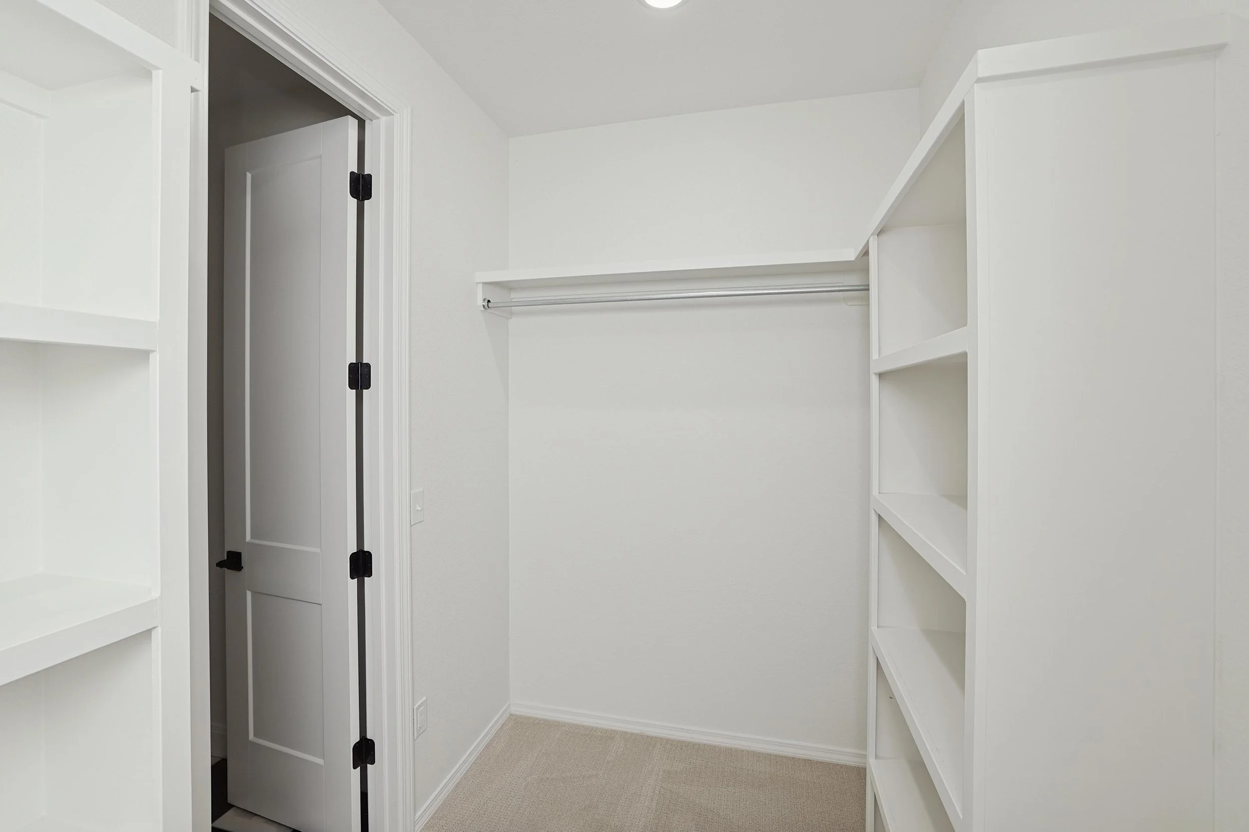 23-Primary Closet Hers.jpg