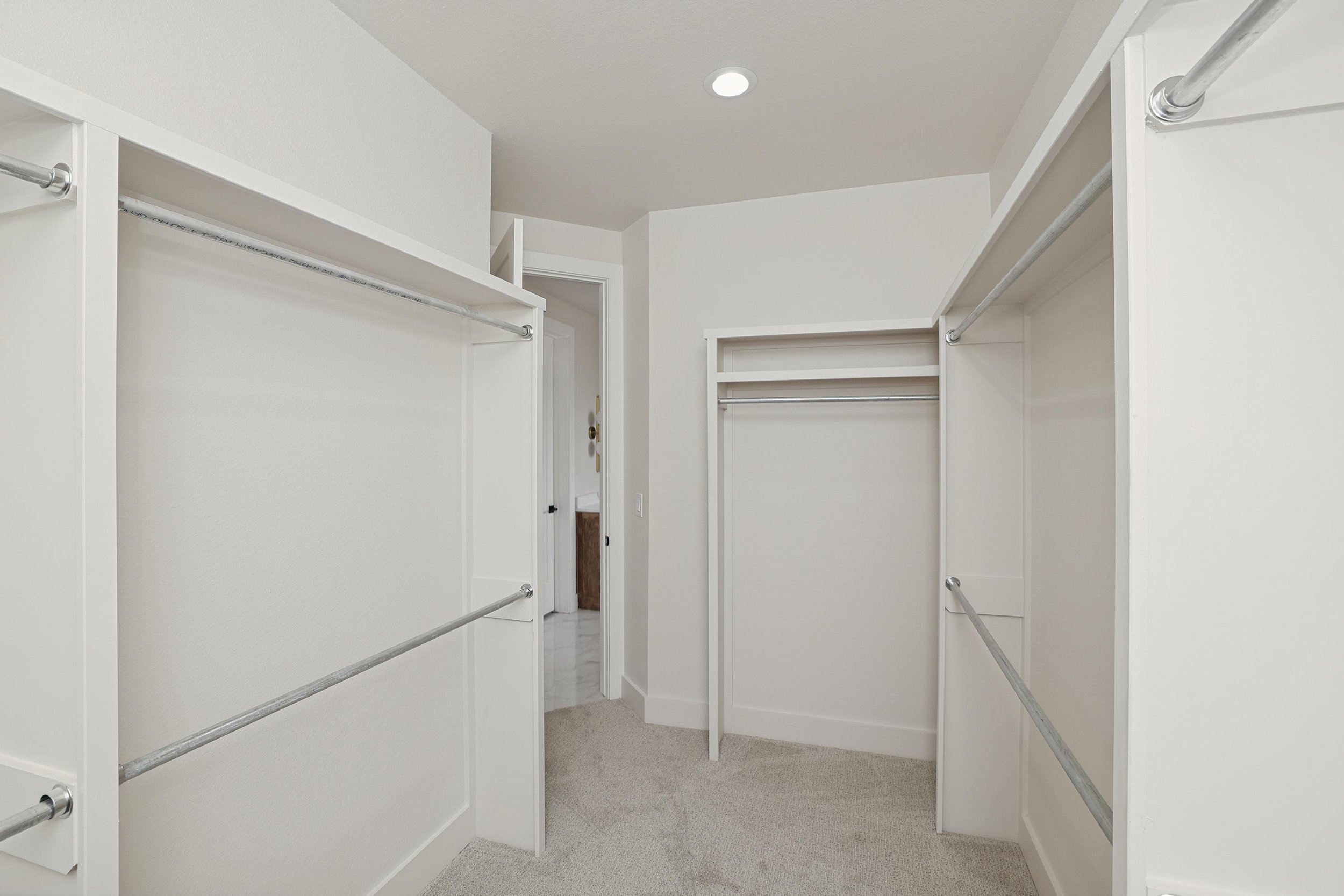 18-Primary Closet Hers.jpg