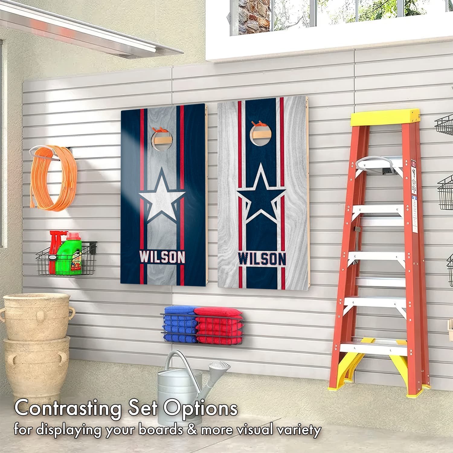 Contrasting set of Personalized New England Patriot Colors custom wood Cornhole boards hanging on display in a garage (Copy) (Copy)