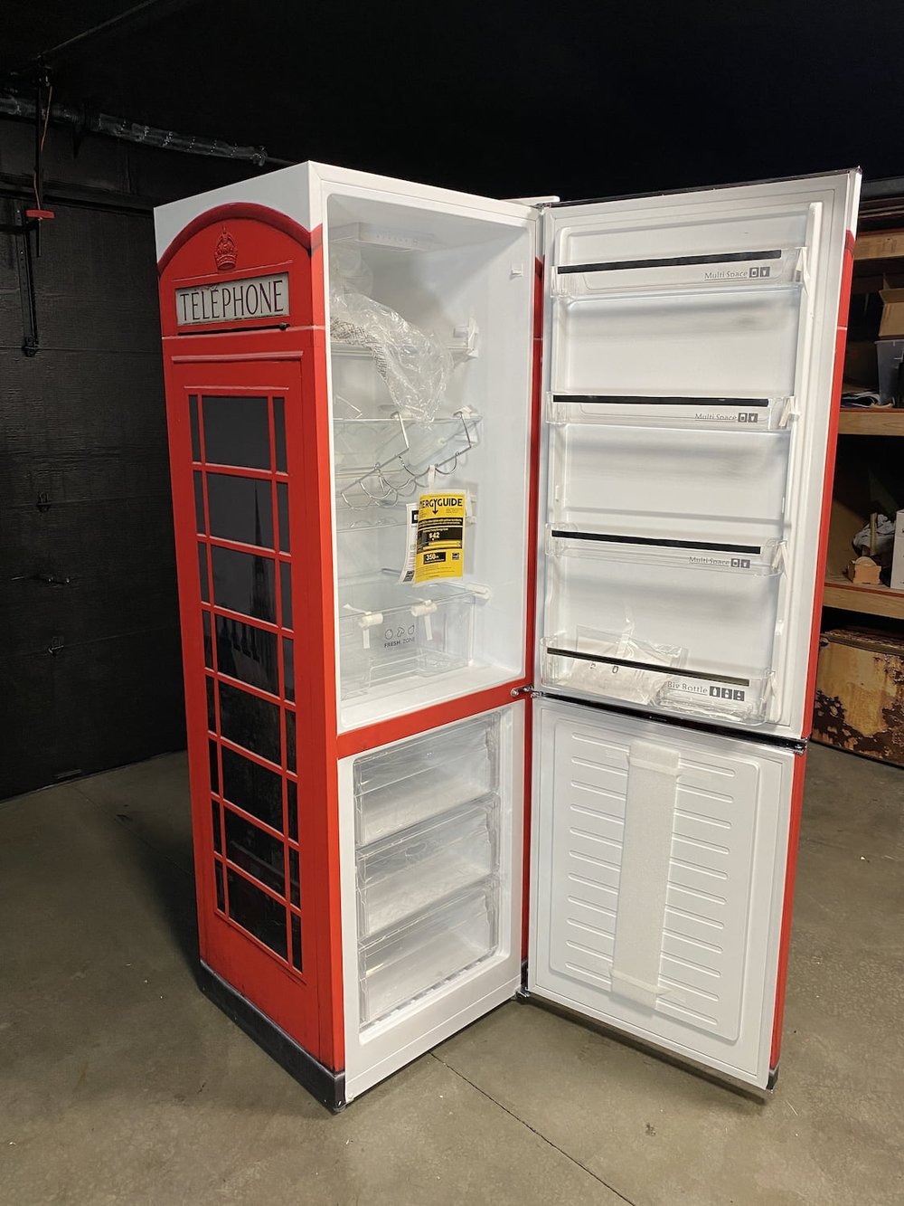 iio Retro-Mod, front-left 45°, open doors, red British phone booth wrap