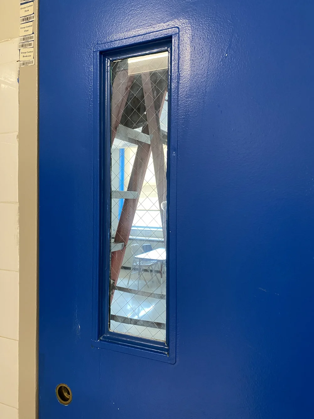 classroom door window, before