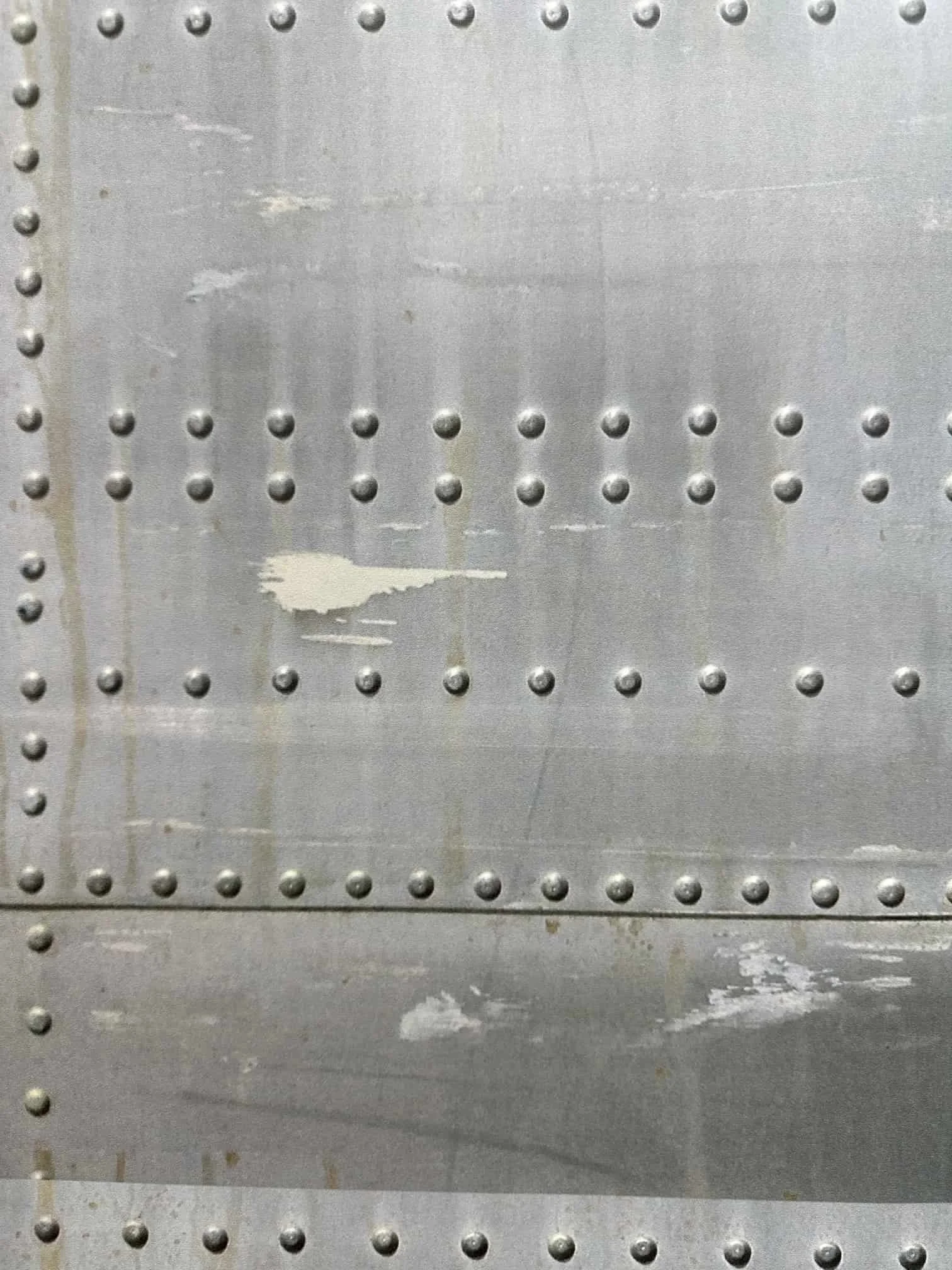 Close up Brushed Aged Aircraft Aluminum with Rivets Door Wrap