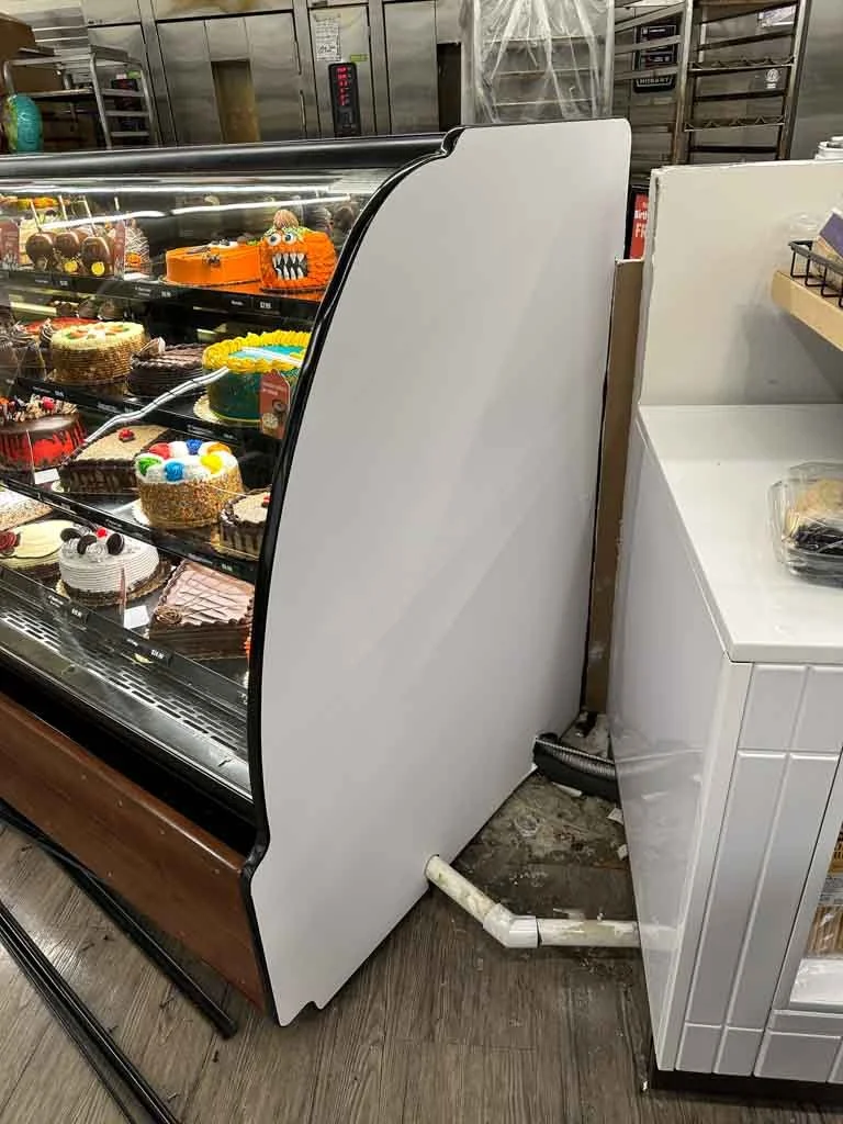 Bakery Display Wrapped in White Vinyl
