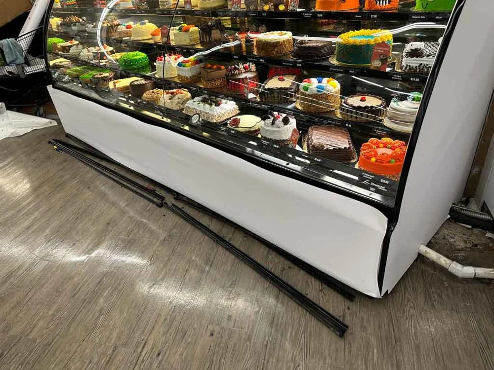 Bakery Display Wrapped in White Vinyl