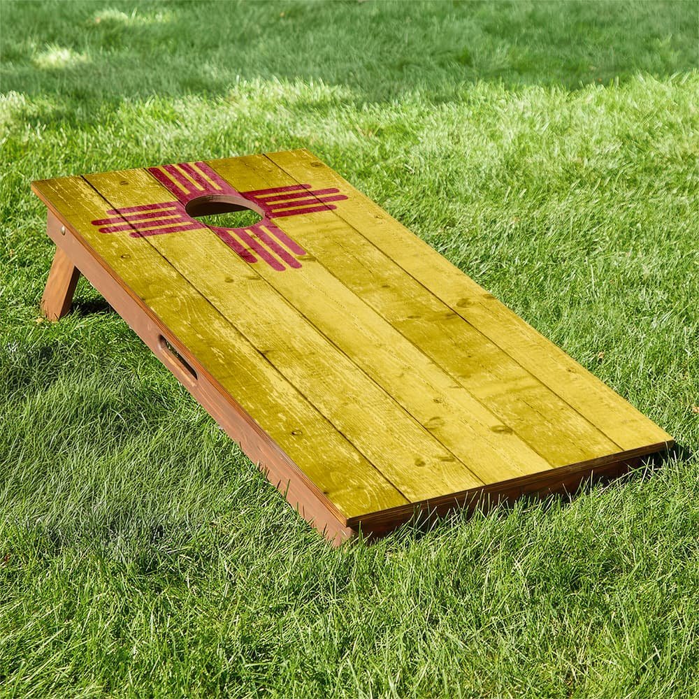 rustic wood New Mexico state flag cornhole board - "Drain It" orientation