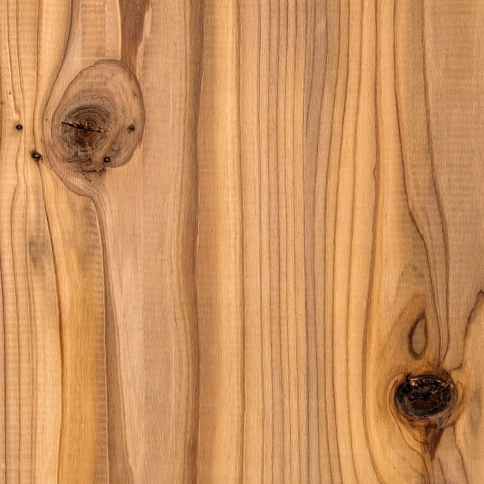 close up of our knotty alder wood grain texture vinyl wrap