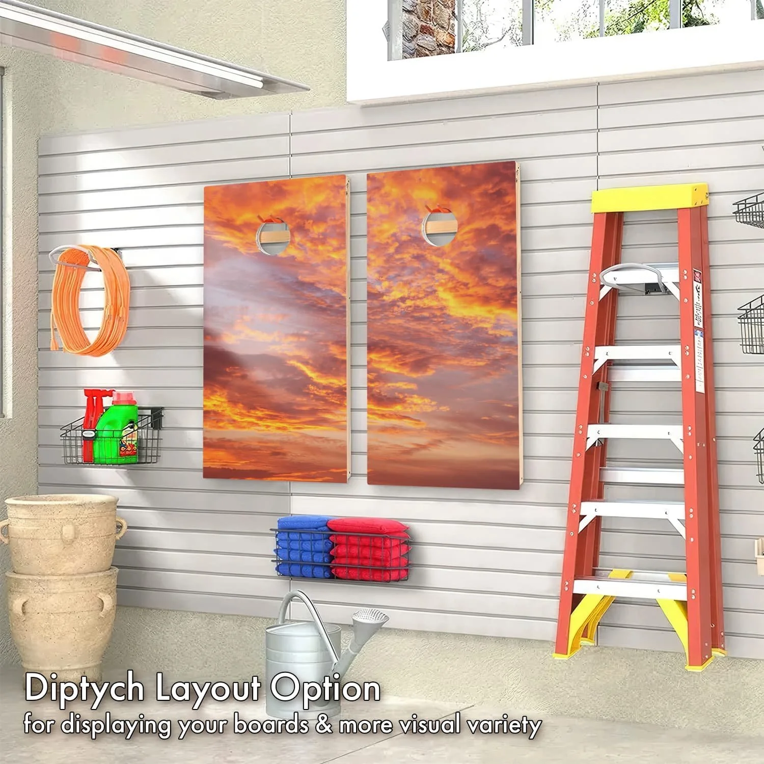 pink and orange cloudy sunset Cornhole board diptych set on display in a garage