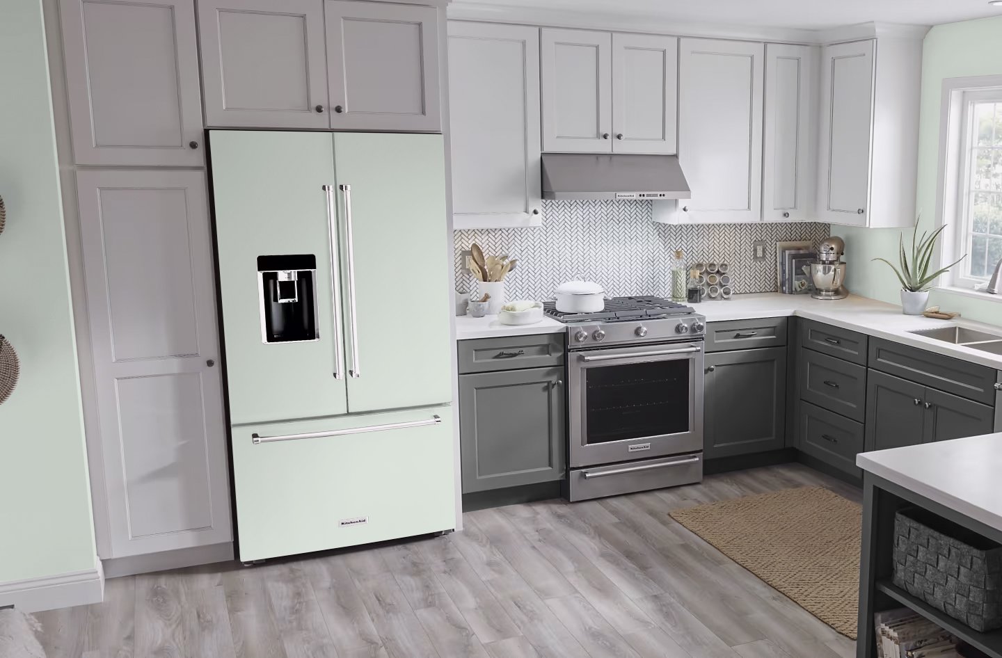 Mockup of our custom printed refrigerator vinyl wrap that matches Sherwin Williams Fleeting Green SW 6455 on a french door refrigerator in a modern neutral color kitchen.