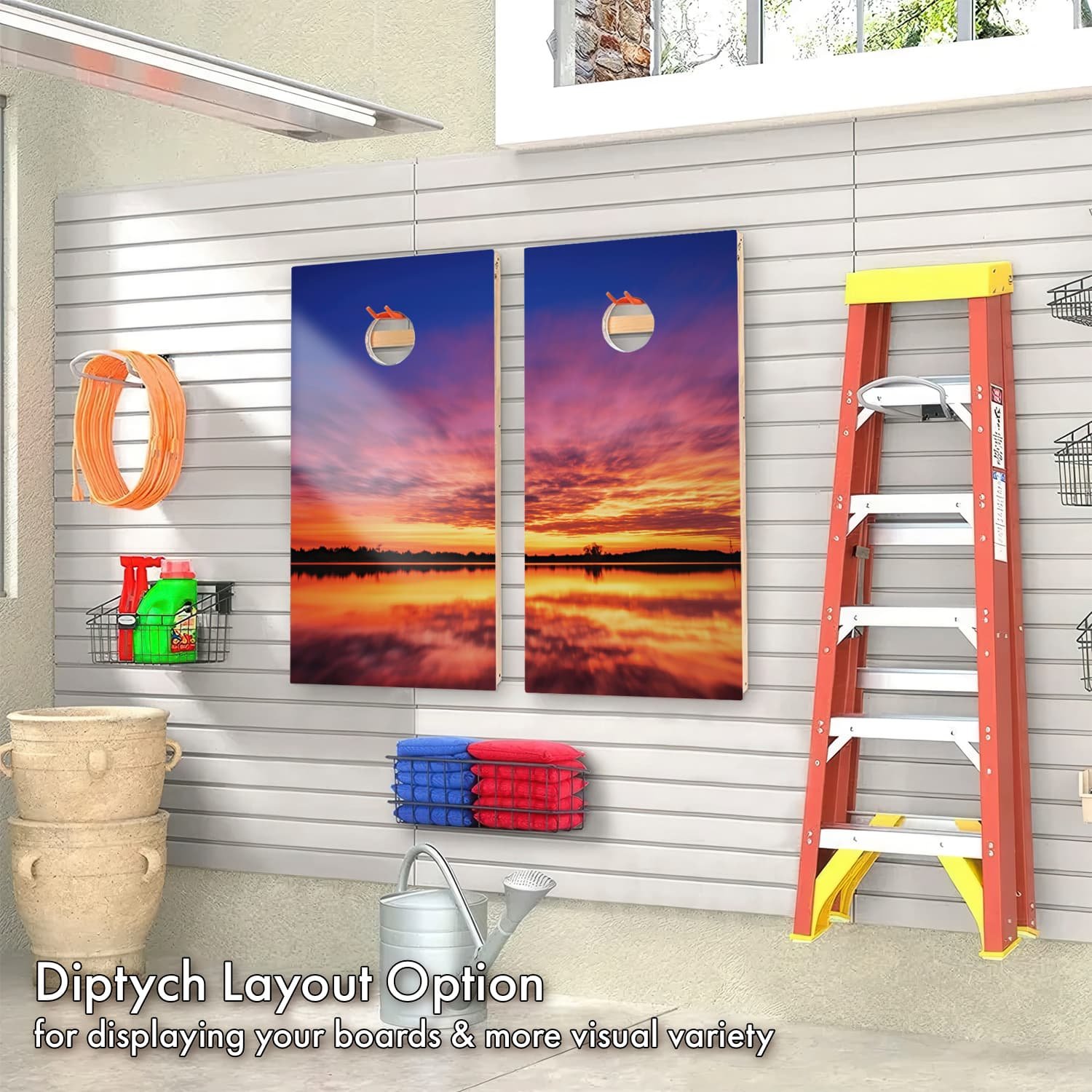 blue orange lake sunset photograph cornhole boards on display on a garage wall