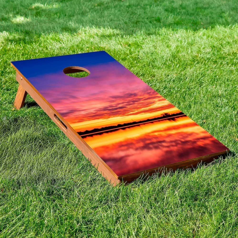 blue orange lake sunset photograph cornhole board