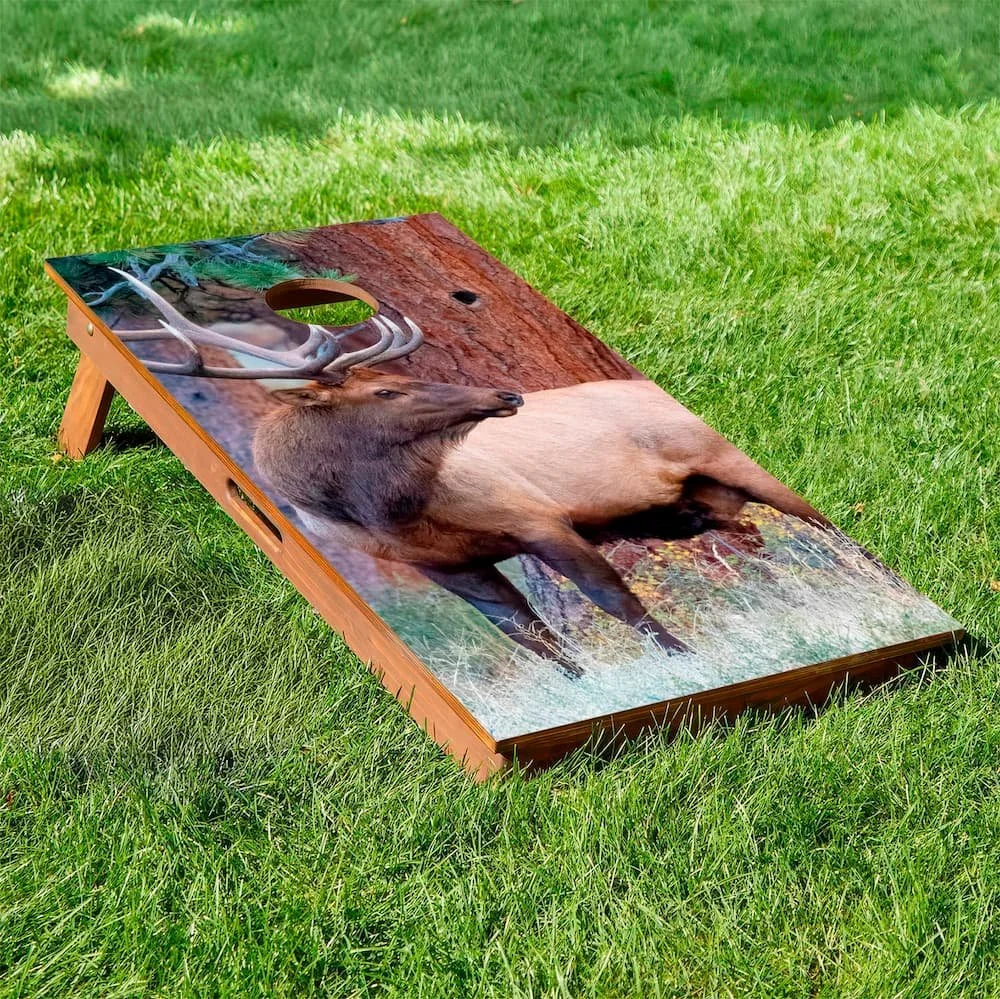 bull elk in nature rustic cornhole board