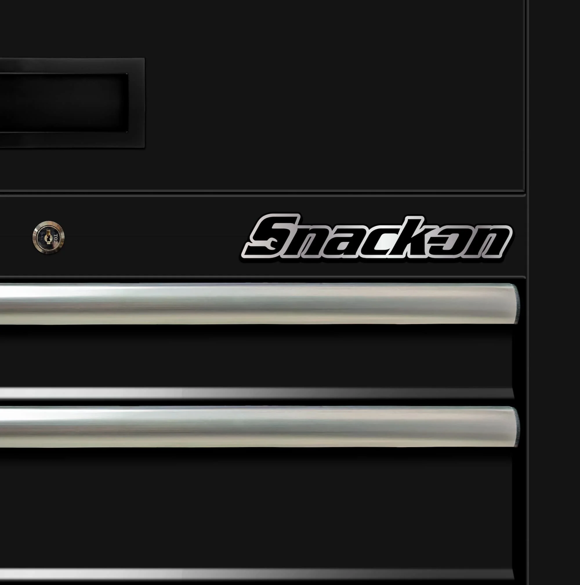 close up showing the detail and quality in our black tool chest wrap with "snack-on" badge