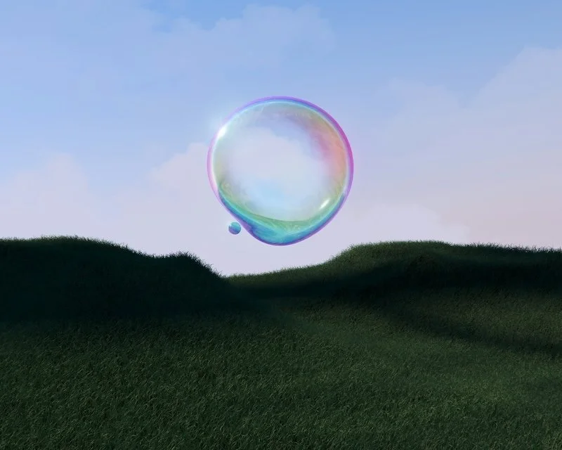 Large iridescent bubbles floating away.