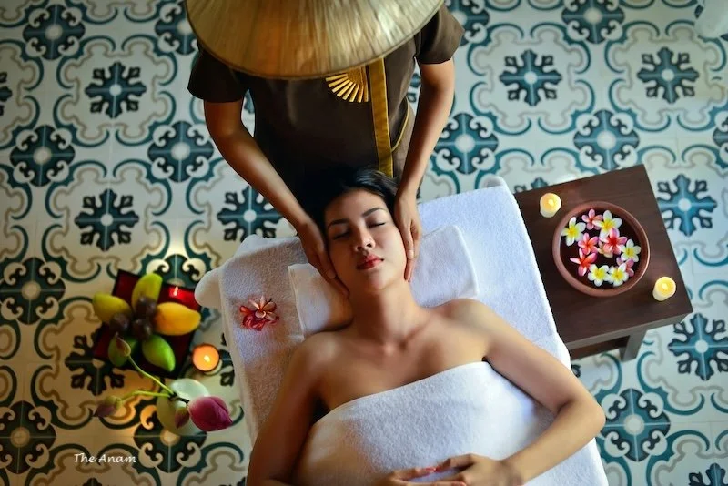 A woman enjoying a massage.