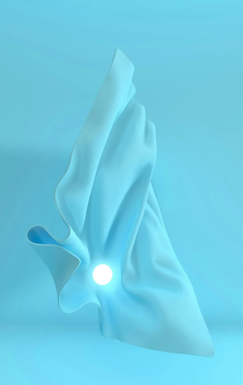 A blue cloth floating away leaving a light behind.