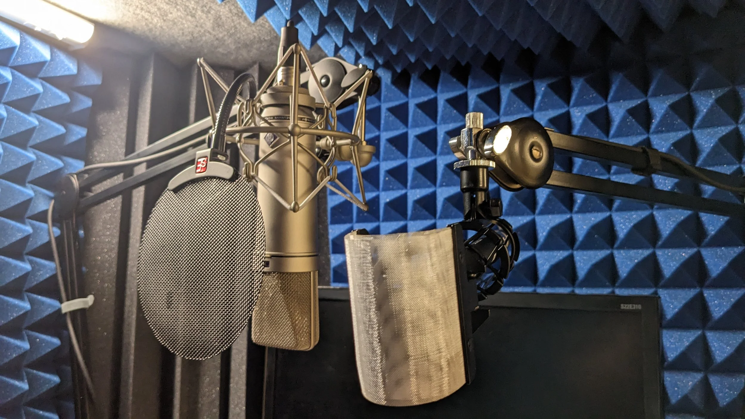 Microphones in a voiceover recording booth