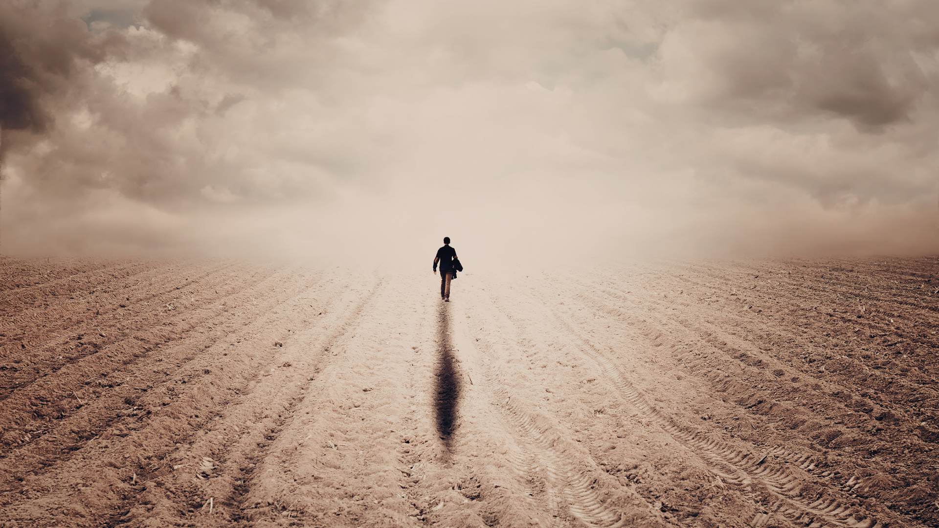 personal walking in empty field