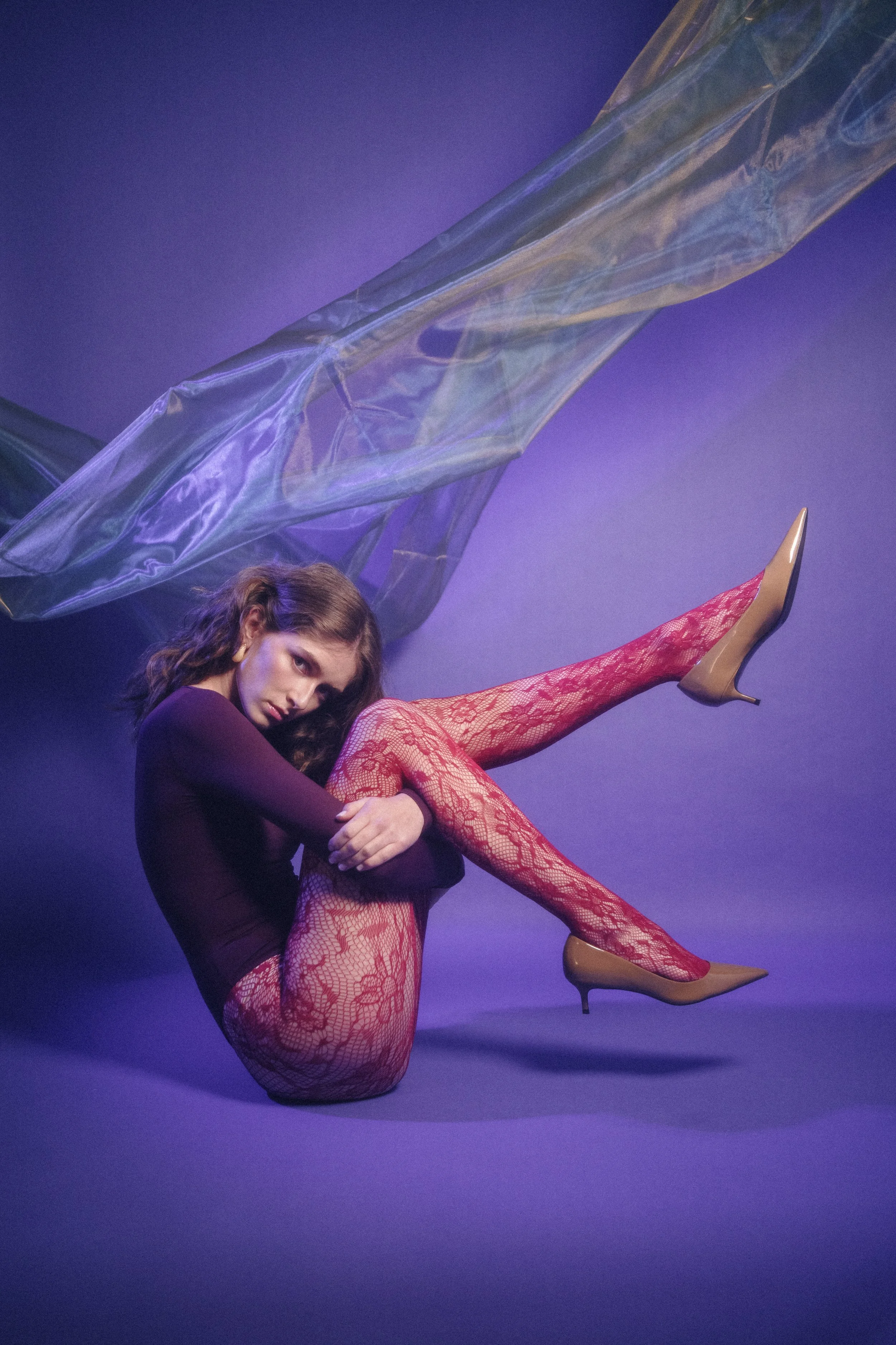 Fashion portrait showcasing confident posing, strong attitude, and expressive styling.