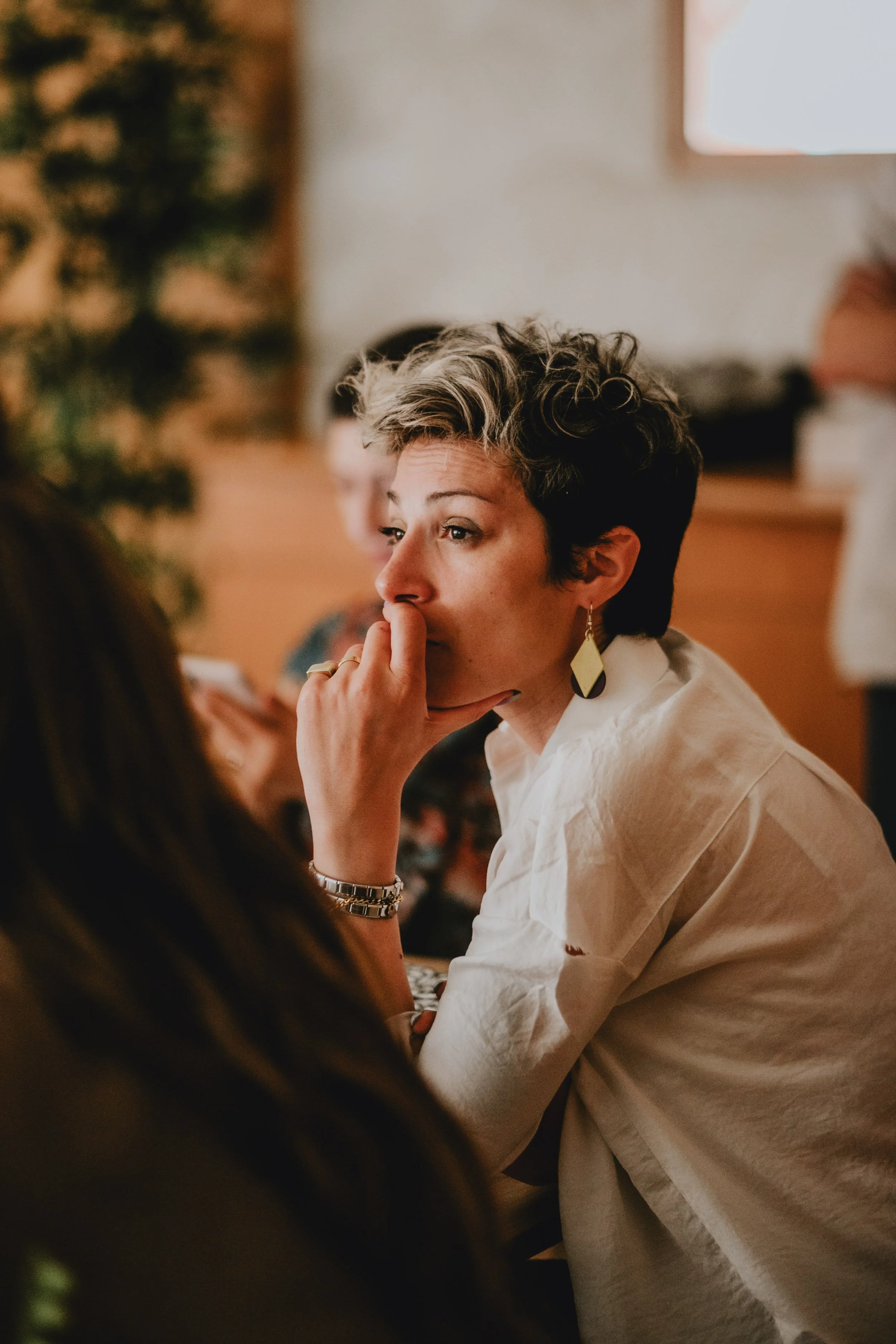 Person listening to the speaker