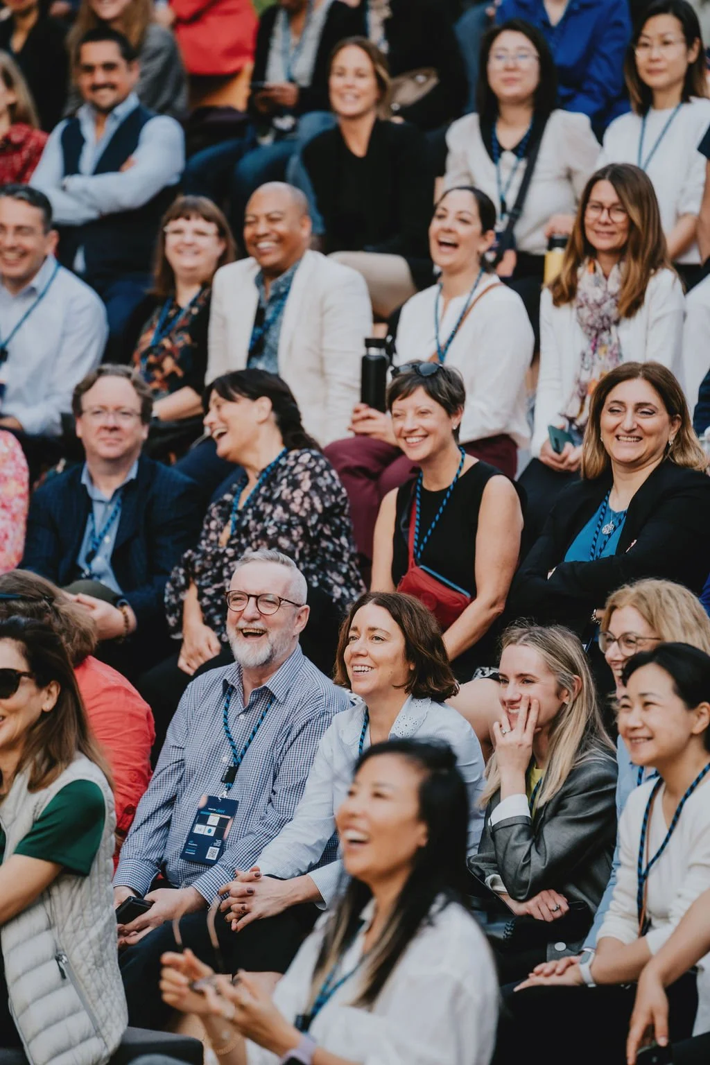 Crowd laughing in a panel
