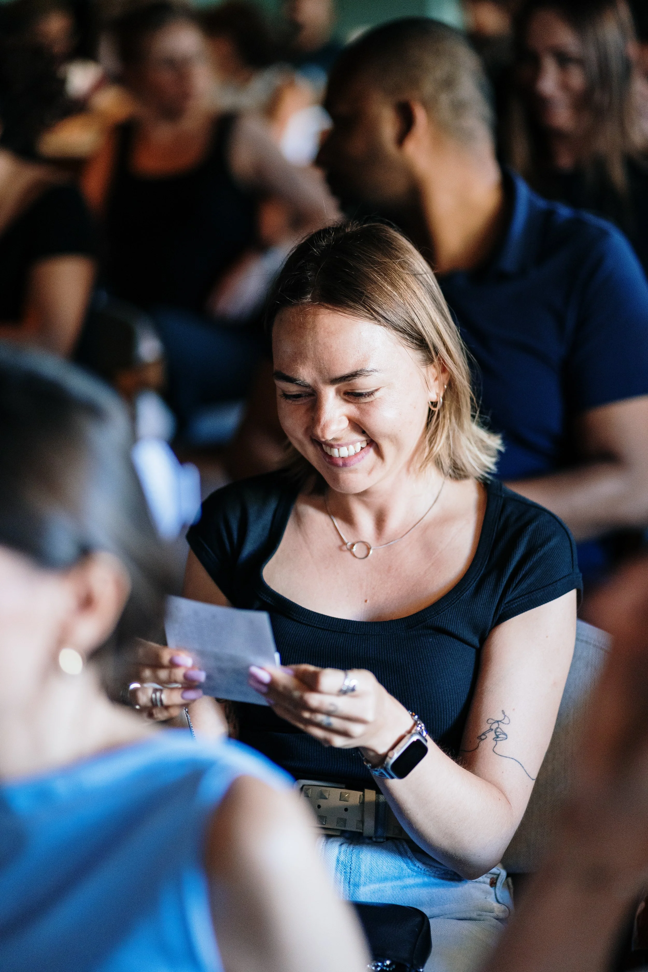 Behind-the-scenes event photography capturing candid preparation moments during an event.