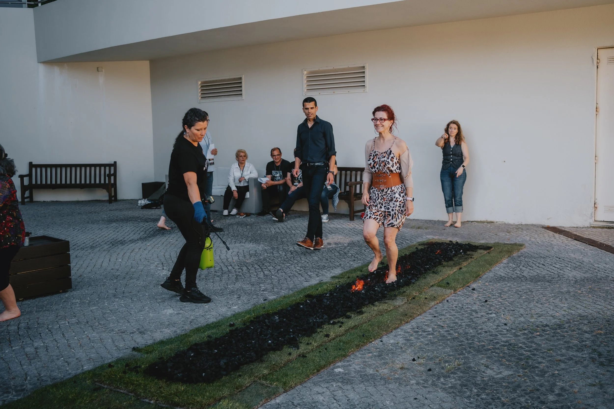 Event photography showing groups of attendees enjoying a shared moment during a live event.