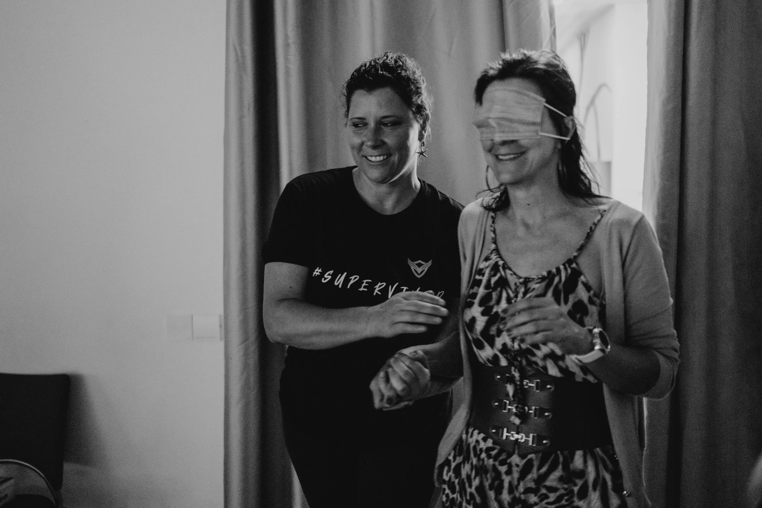 Black and white event photography focusing on emotion, interaction, and storytelling.