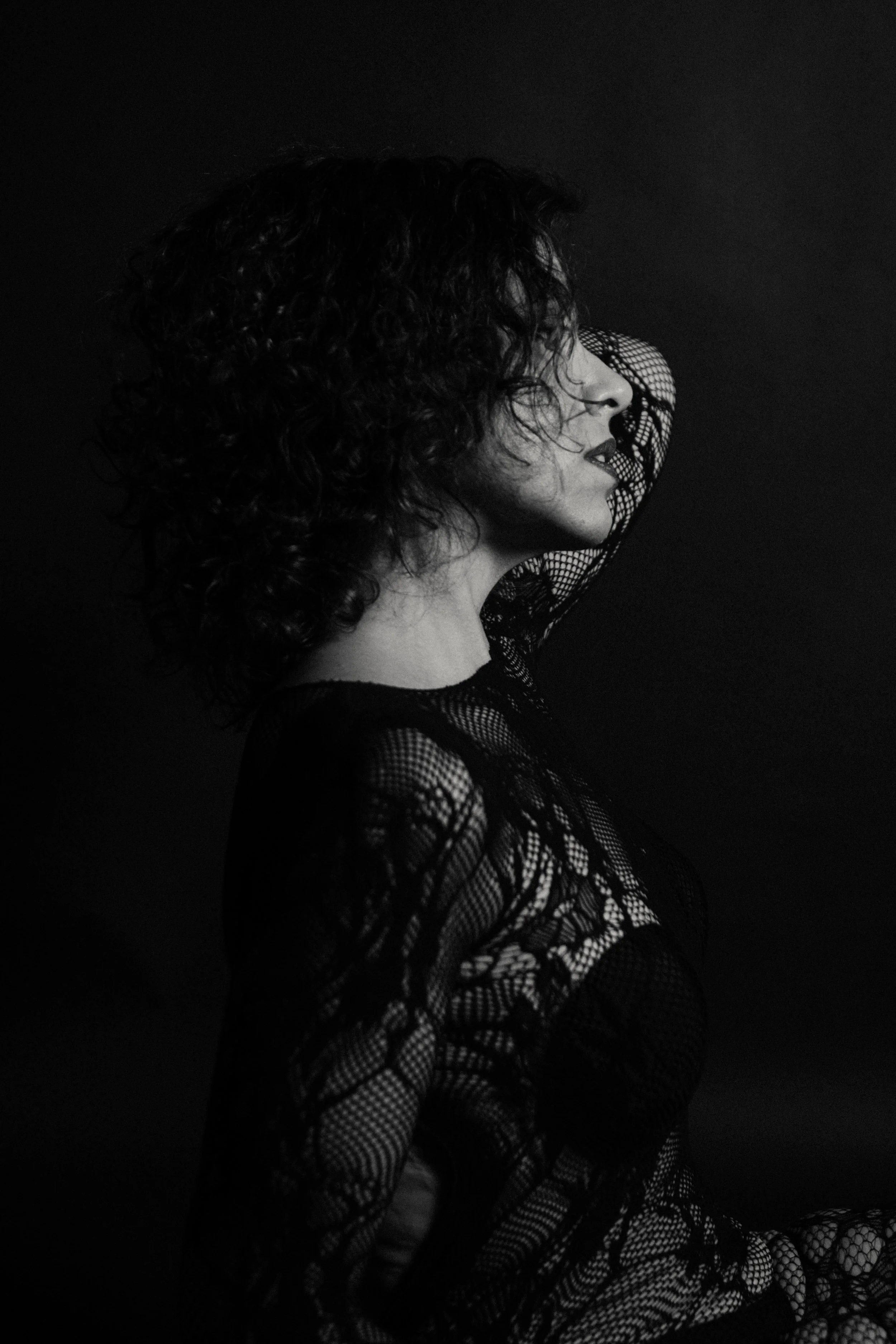 Black and white artistic portrait focused on texture, expression, and emotional intensity.