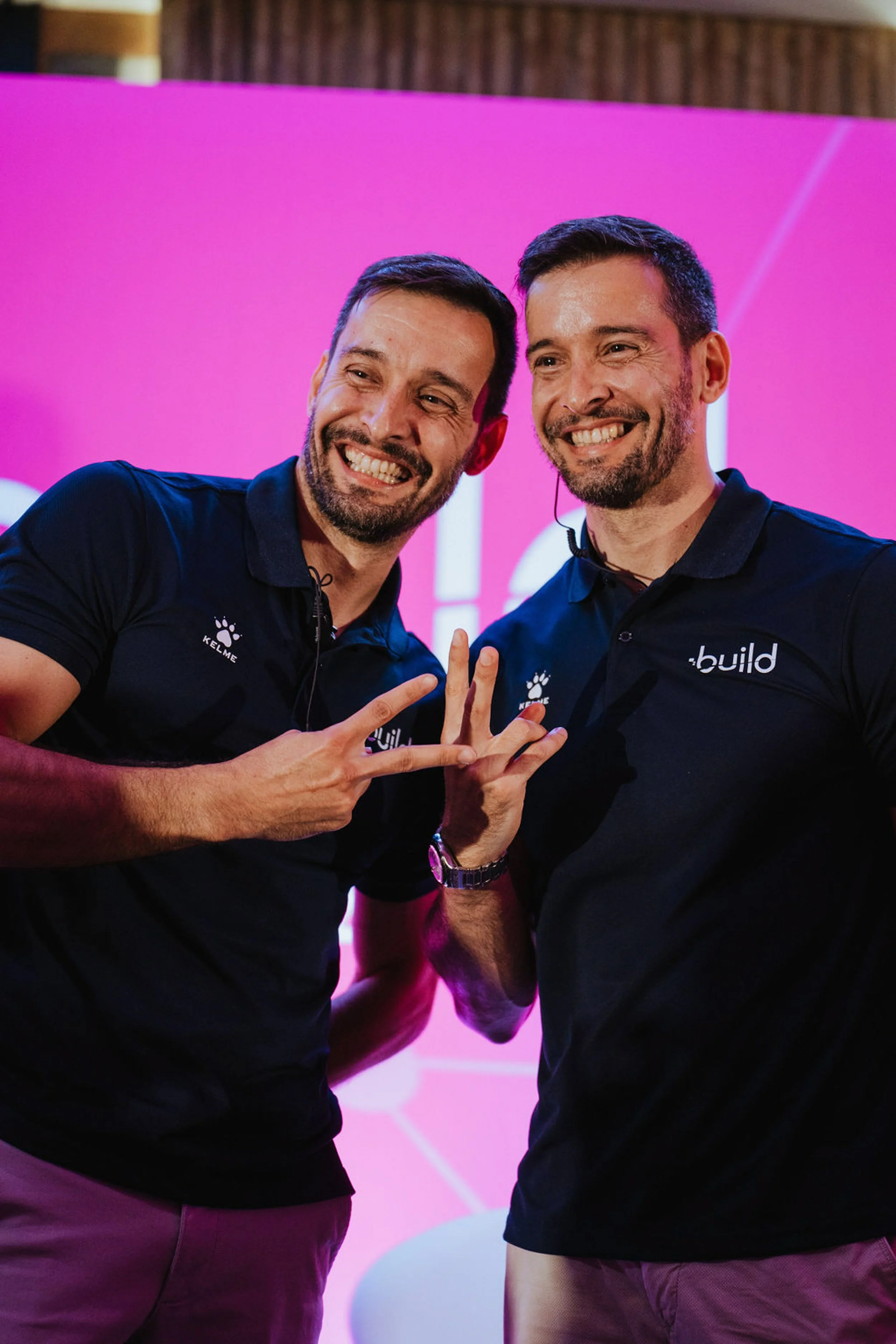 People smiling happy at an event