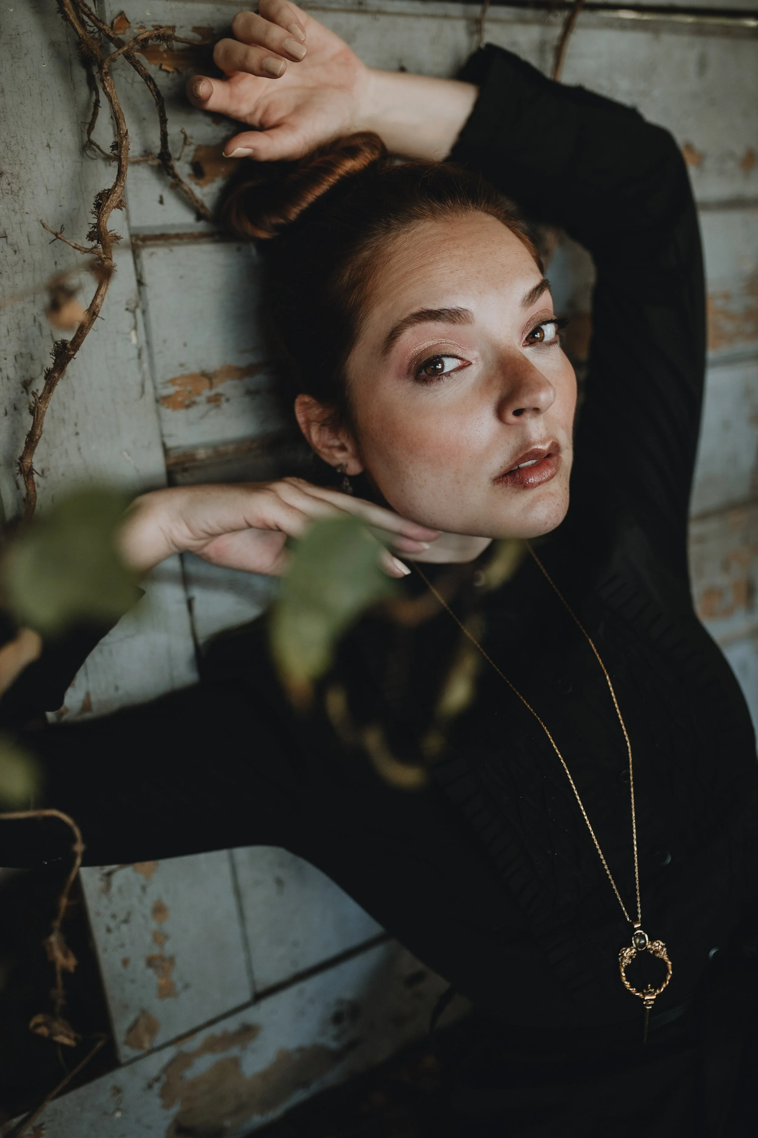 Model posing in a greenhouse
