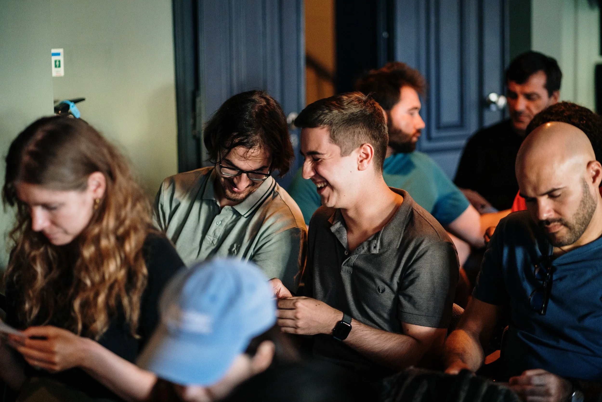 Behind-the-scenes event photography capturing candid preparation moments during an event.