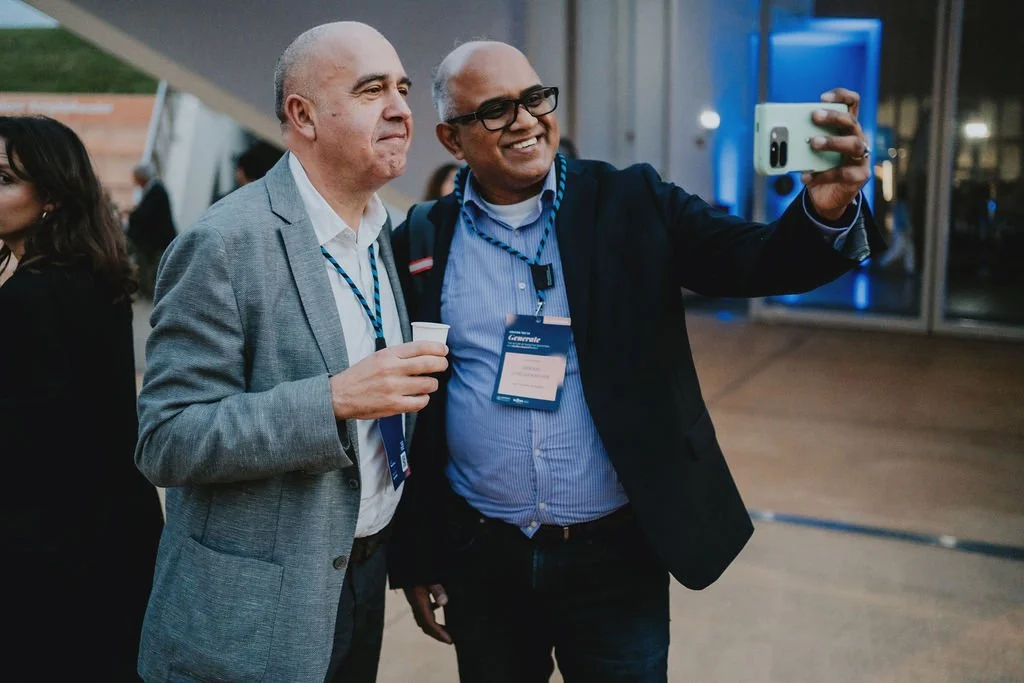 People taking a selfie in an event