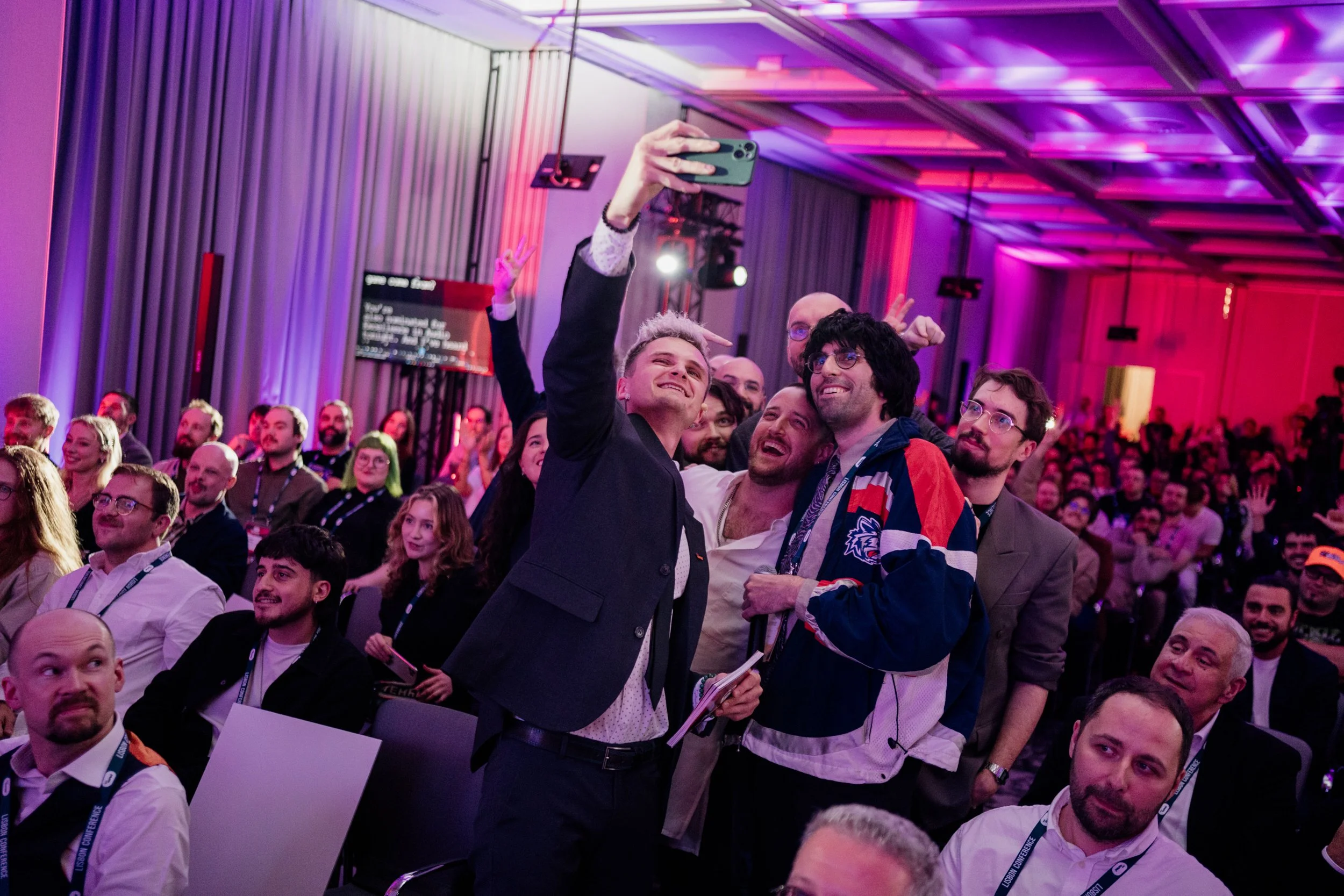 Event photography documenting an award presentation moment during a corporate event.