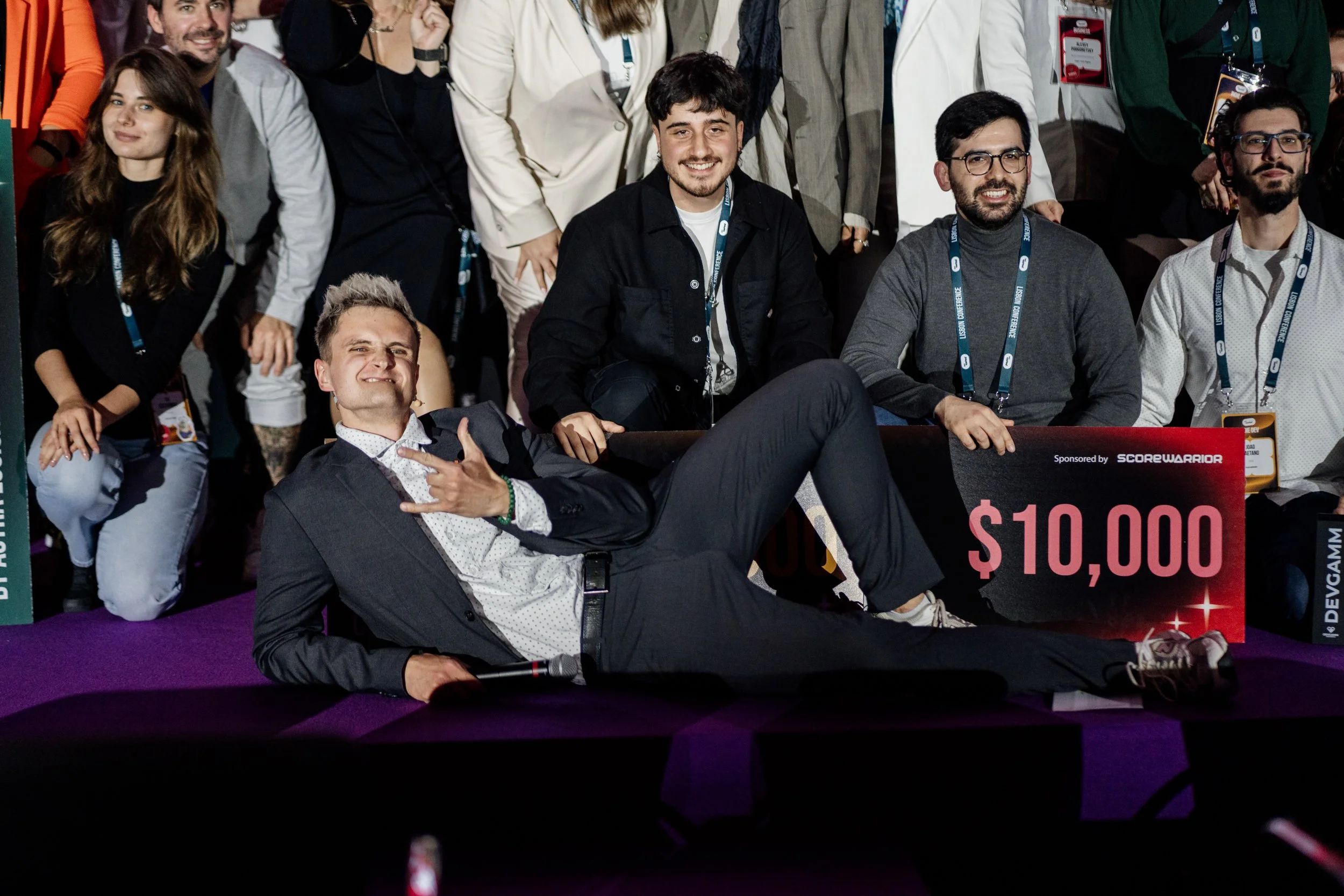 Event photography documenting an award presentation moment during a corporate event.