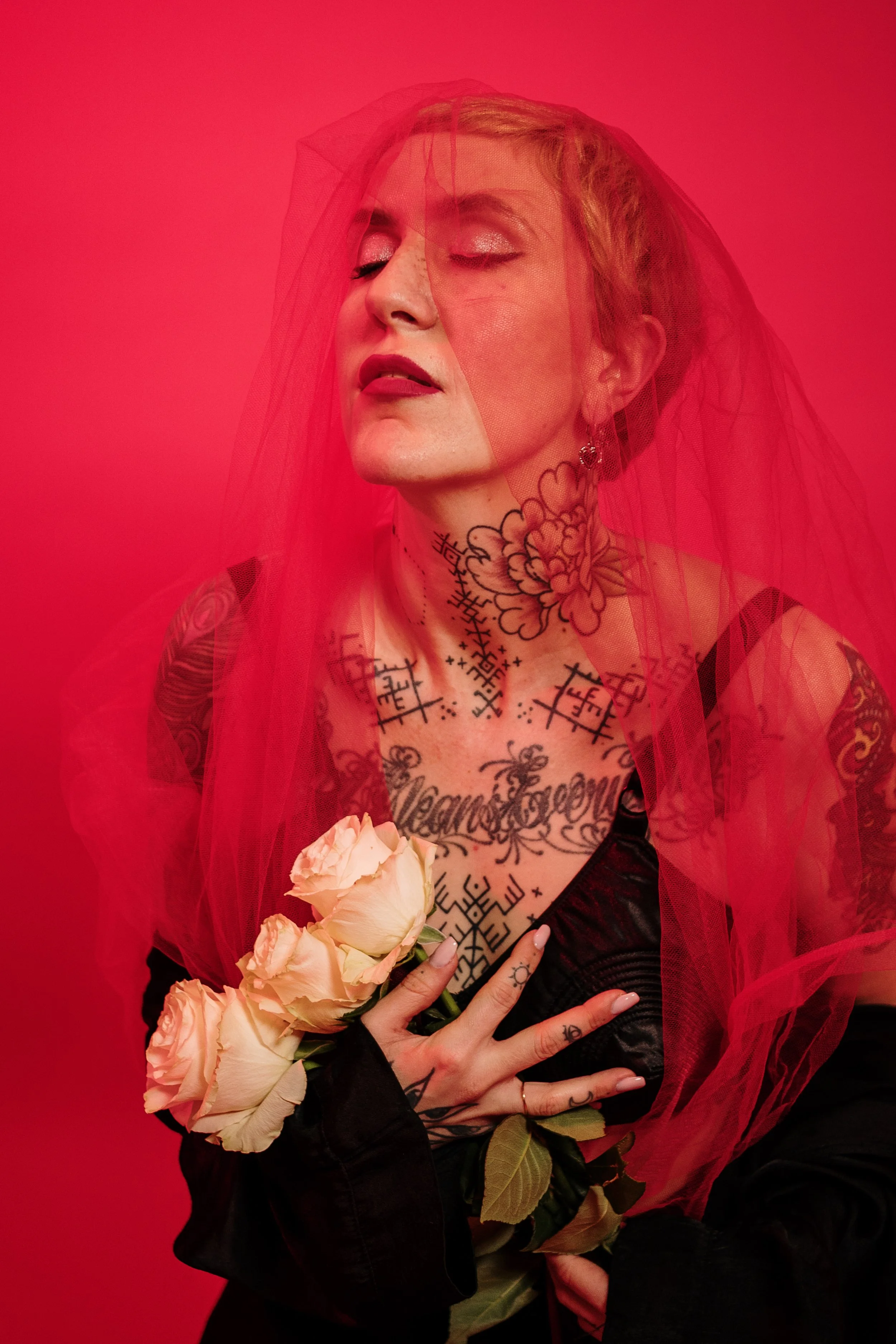 Creative female portrait with expressive styling, artistic makeup, and a strong visual identity.