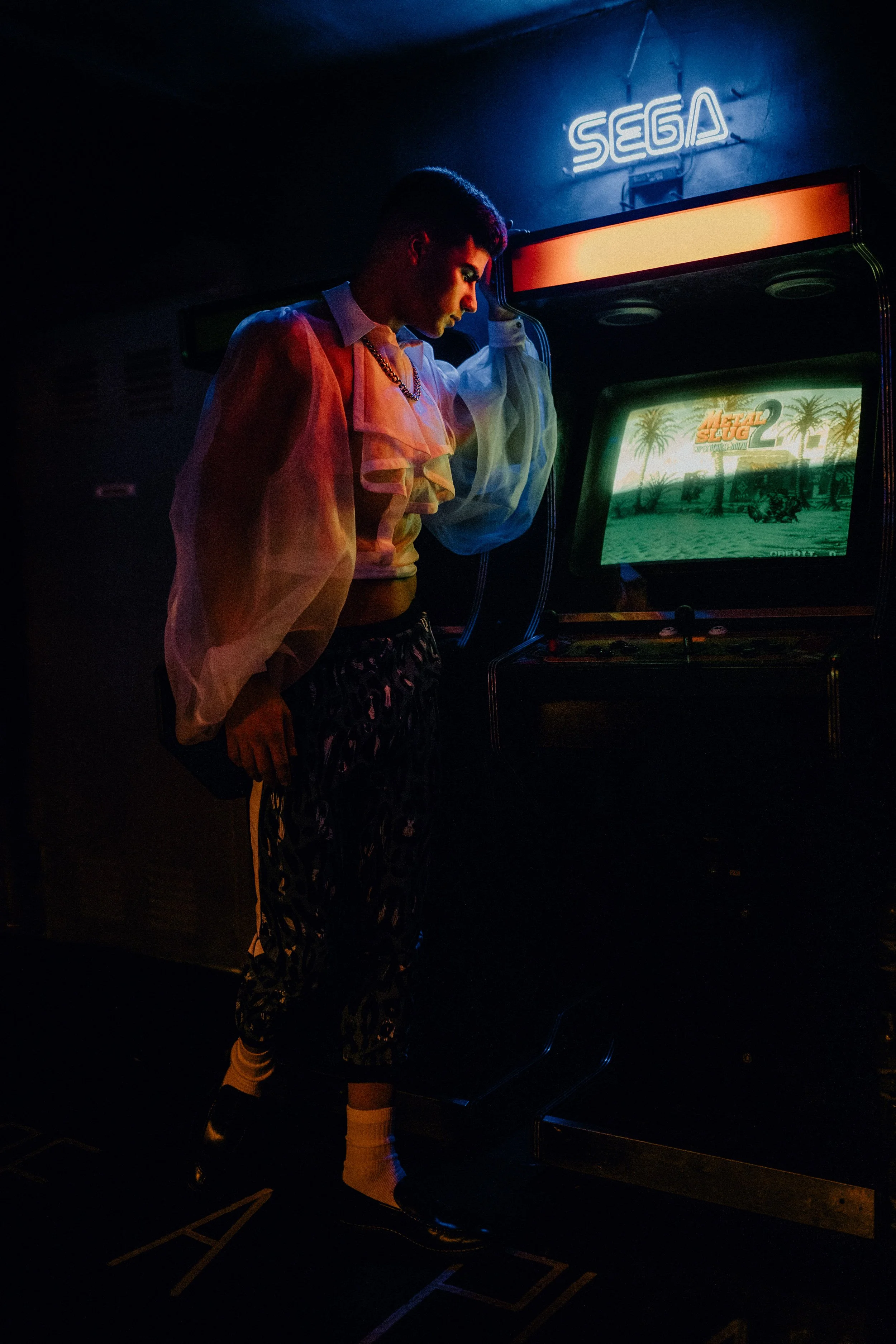 Model in arcade editorial