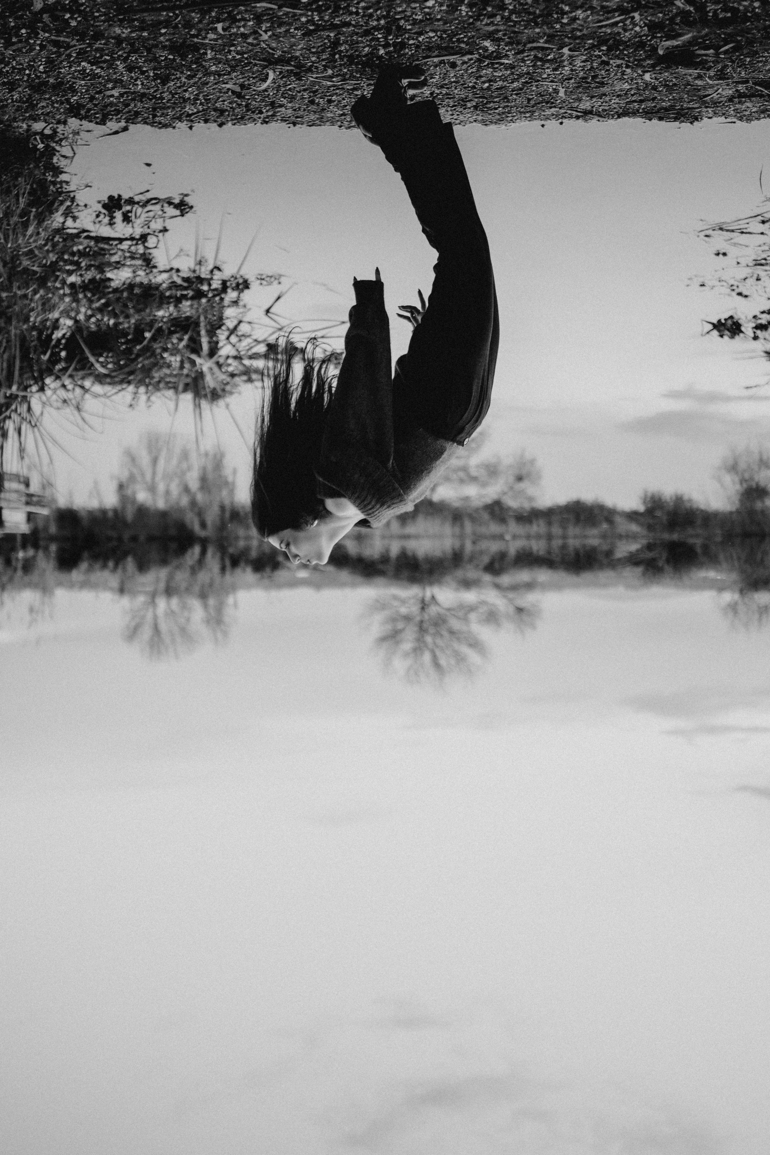 Artistic portrait photographed outdoors with dramatic composition